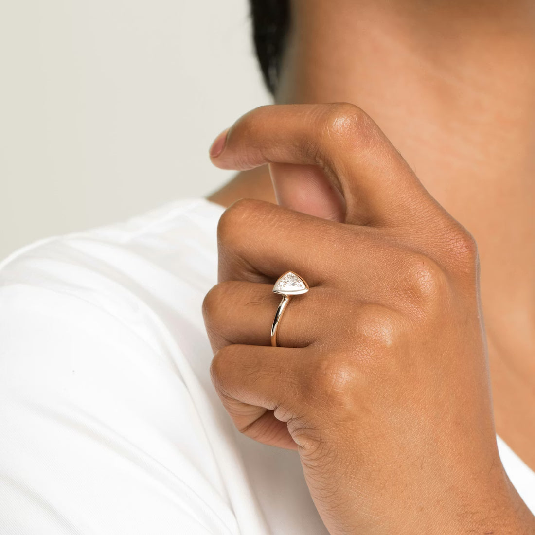 The Signature Bezel Trillion-Cut Yellow Gold Engagement Ring