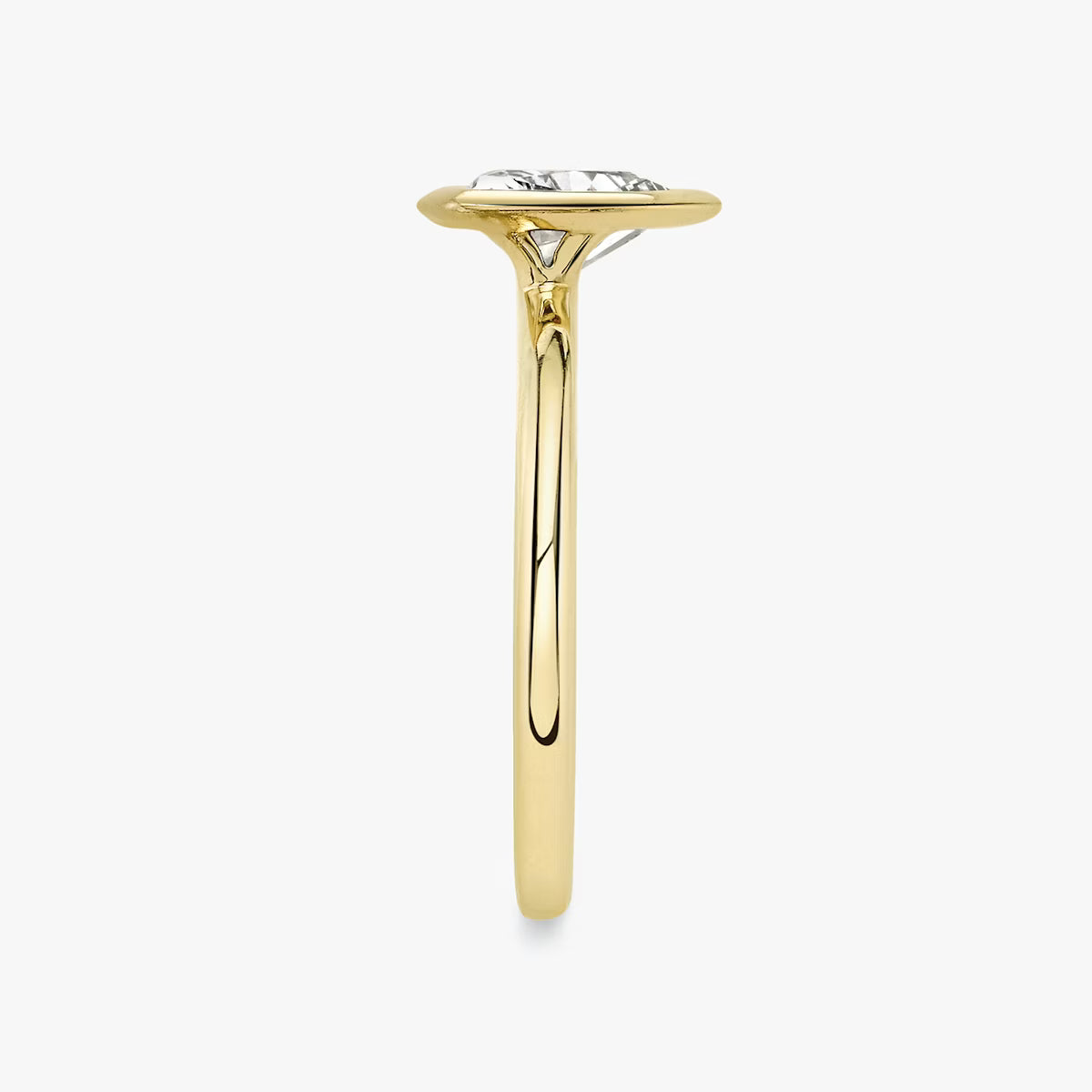 The Signature Bezel Trillion-Cut Yellow Gold Engagement Ring