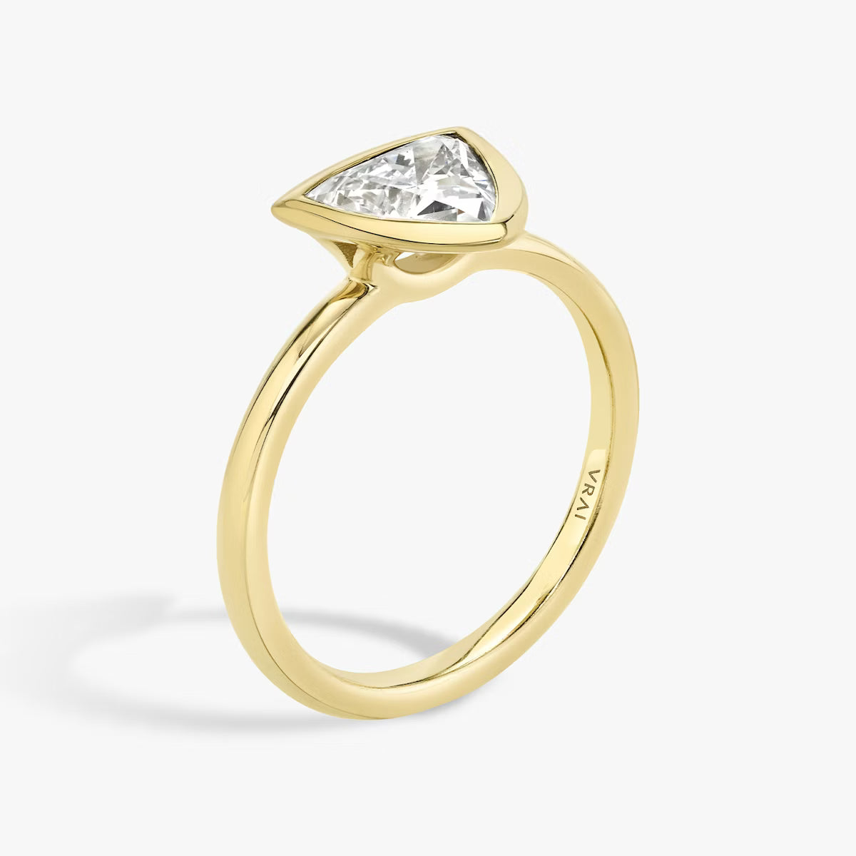 The Signature Bezel Trillion-Cut Yellow Gold Engagement Ring
