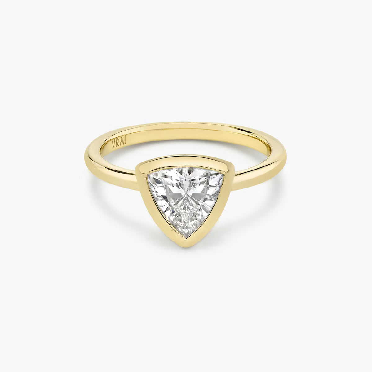 The Signature Bezel Trillion-Cut Yellow Gold Engagement Ring