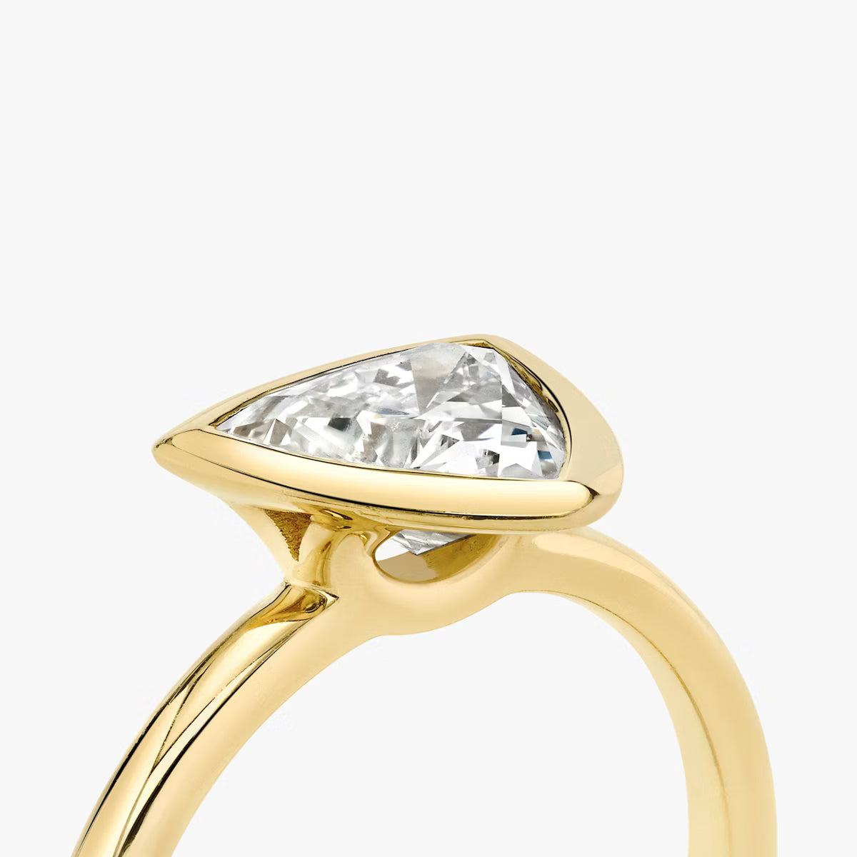 The Signature Bezel Trillion-Cut Yellow Gold Engagement Ring