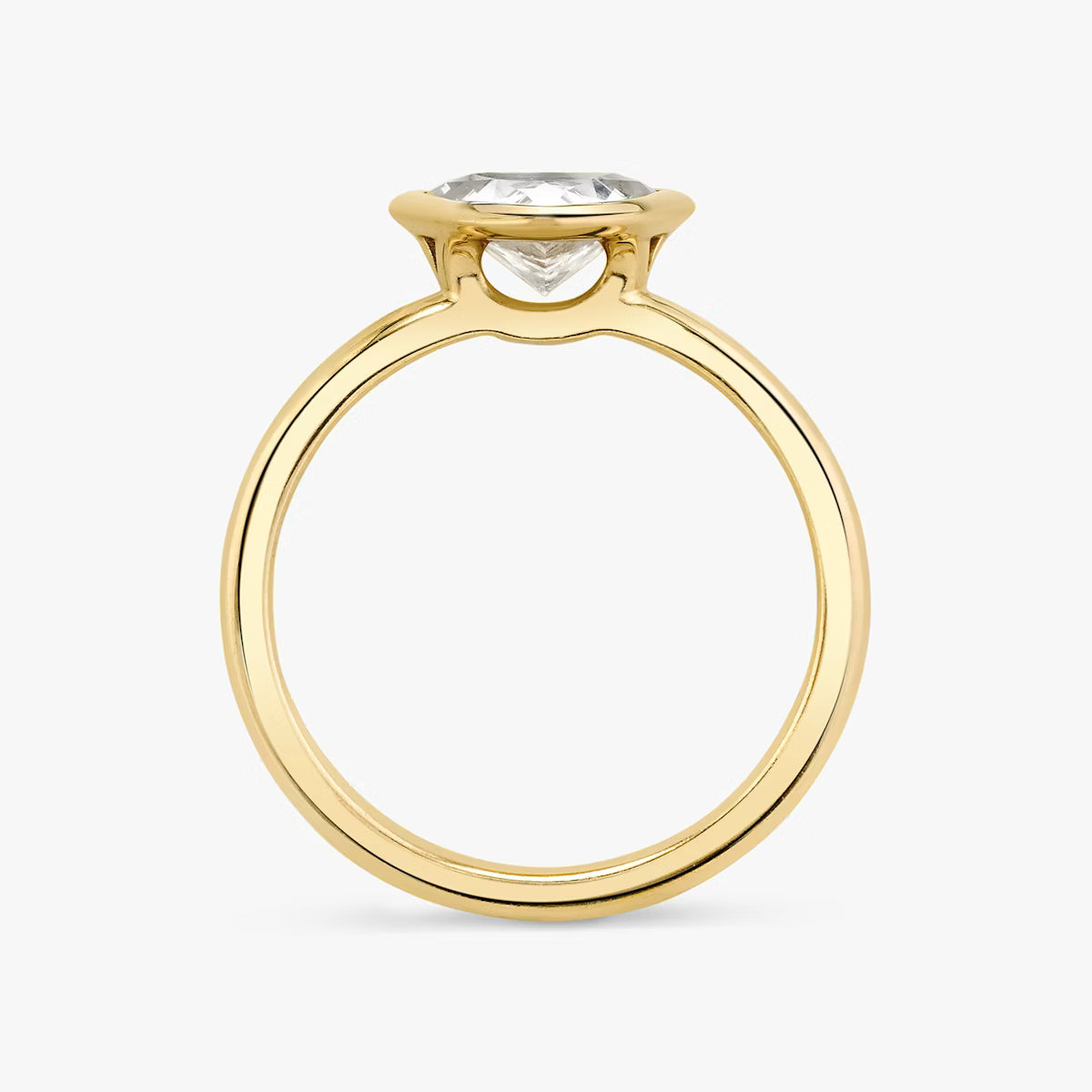 The Signature Bezel Trillion-Cut Yellow Gold Engagement Ring