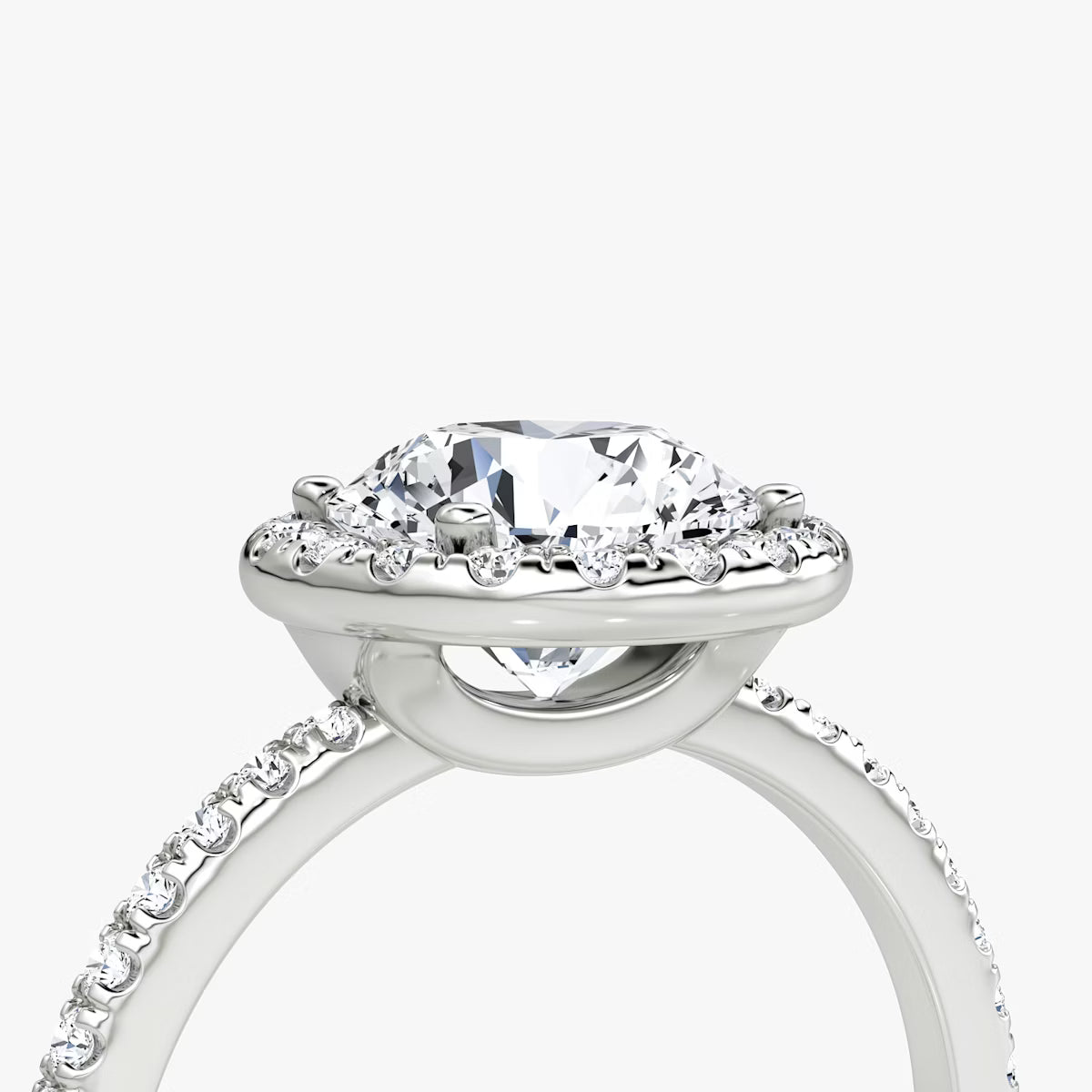 The Radiant Halo Round Brilliant White Gold Engagement Ring