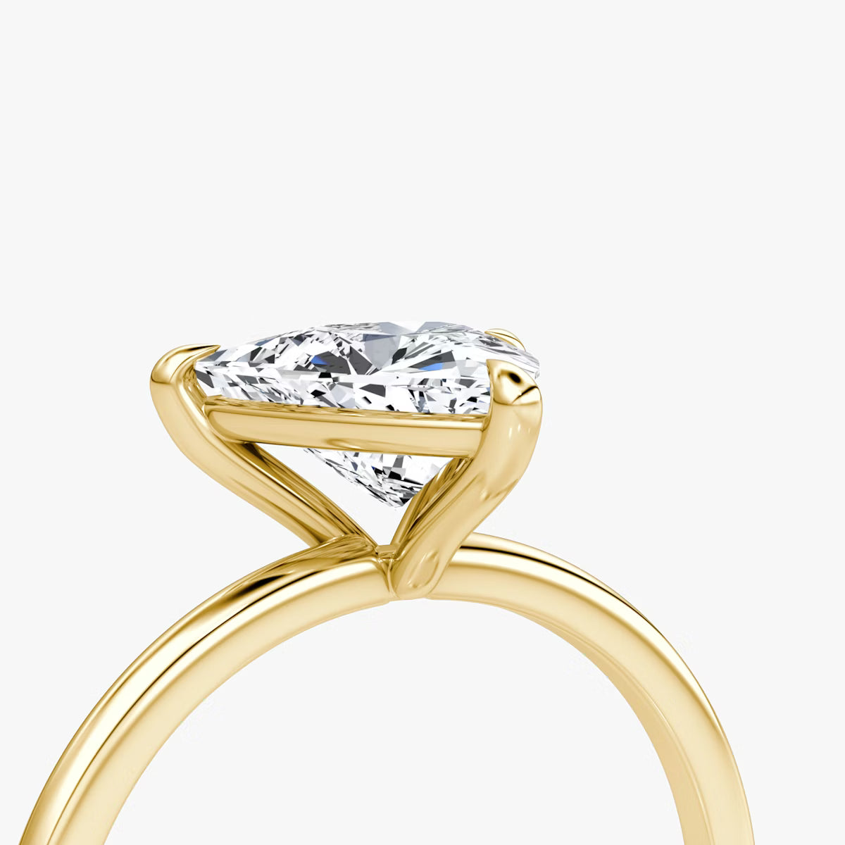 The Petite Four-Prong Trillion-Cut Yellow Gold Solitaire Engagement Ring
