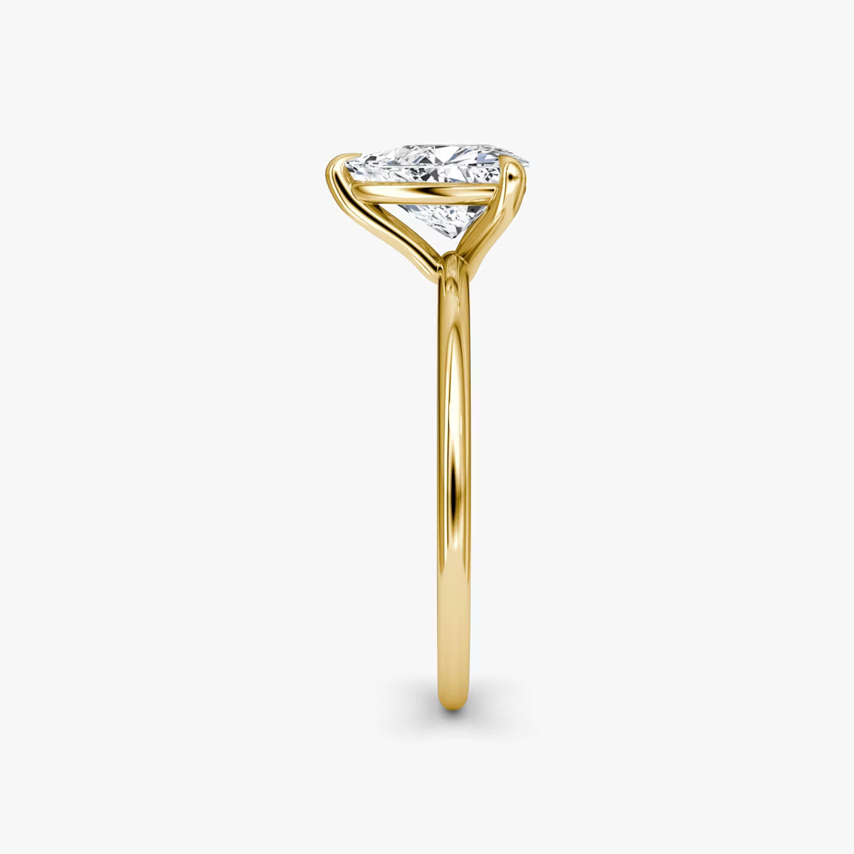 The Petite Four-Prong Trillion-Cut Yellow Gold Solitaire Engagement Ring