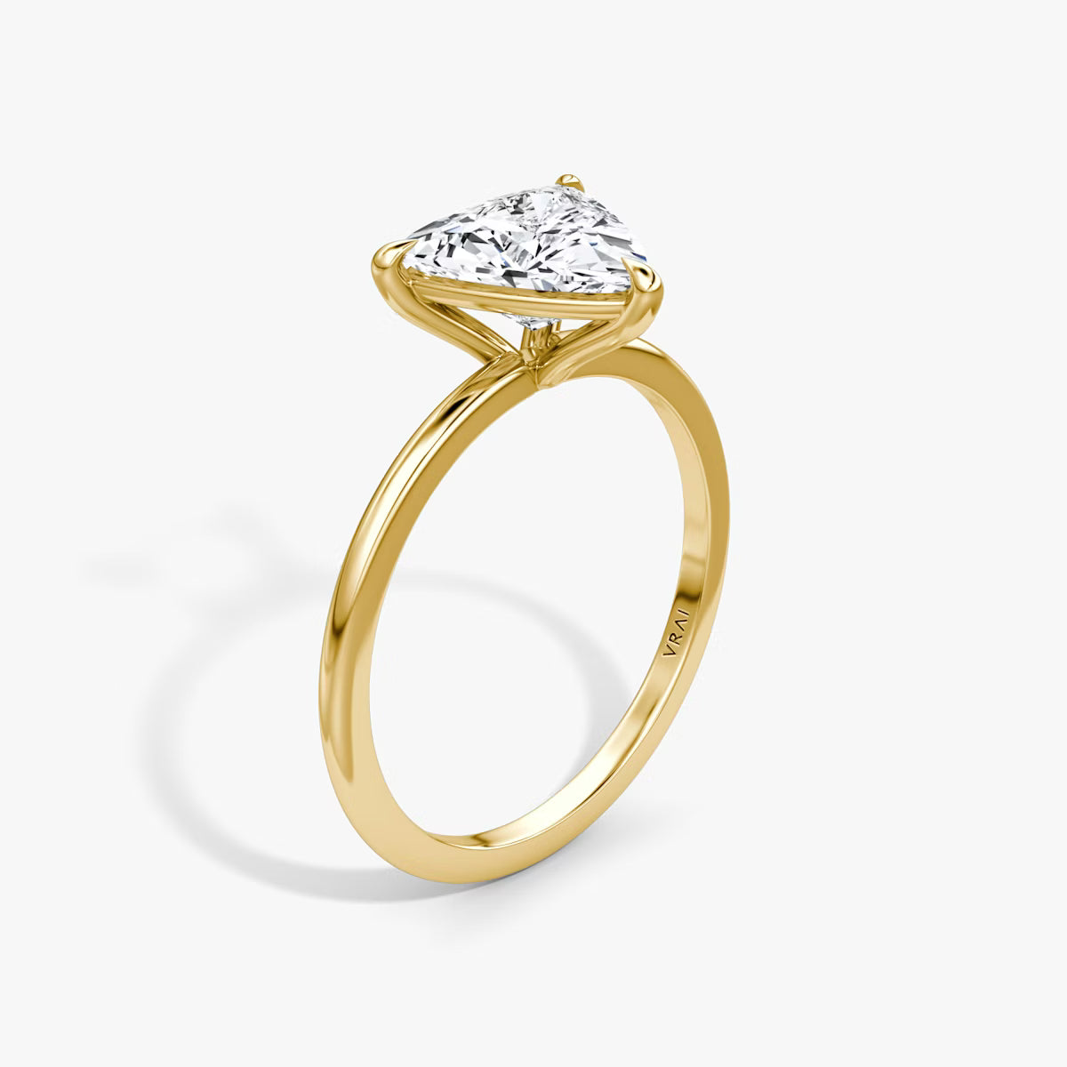 The Petite Four-Prong Trillion-Cut Yellow Gold Solitaire Engagement Ring