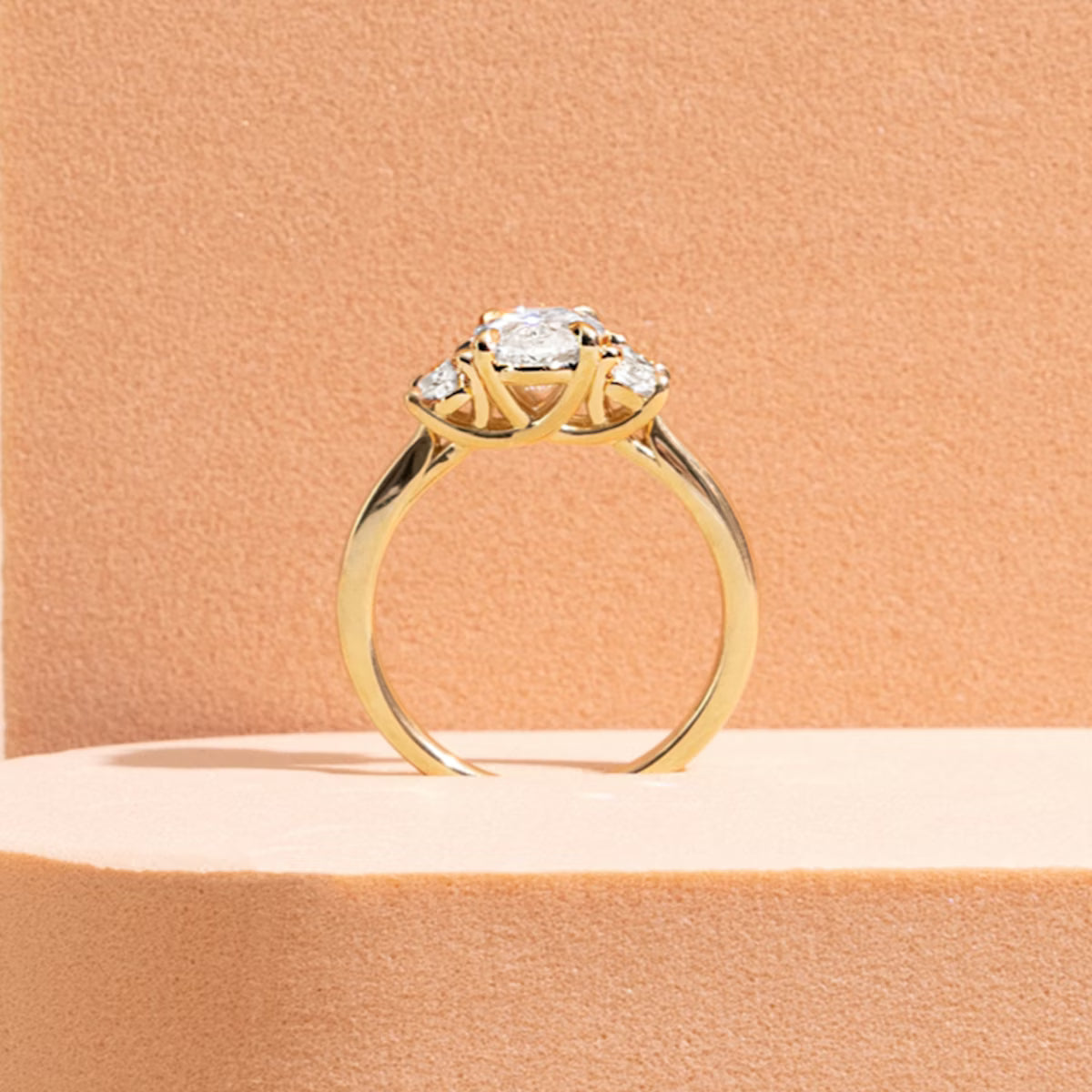 The Trellis Three-Stone Oval Yellow Gold Diamond Engagement Ring