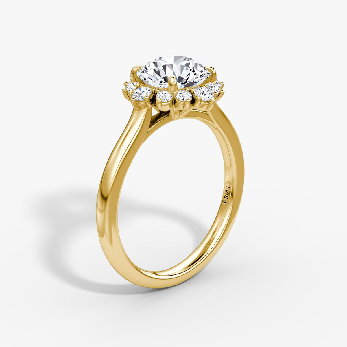 The Aurora Halo Round Brilliant Yellow Gold Diamond Engagement Ring