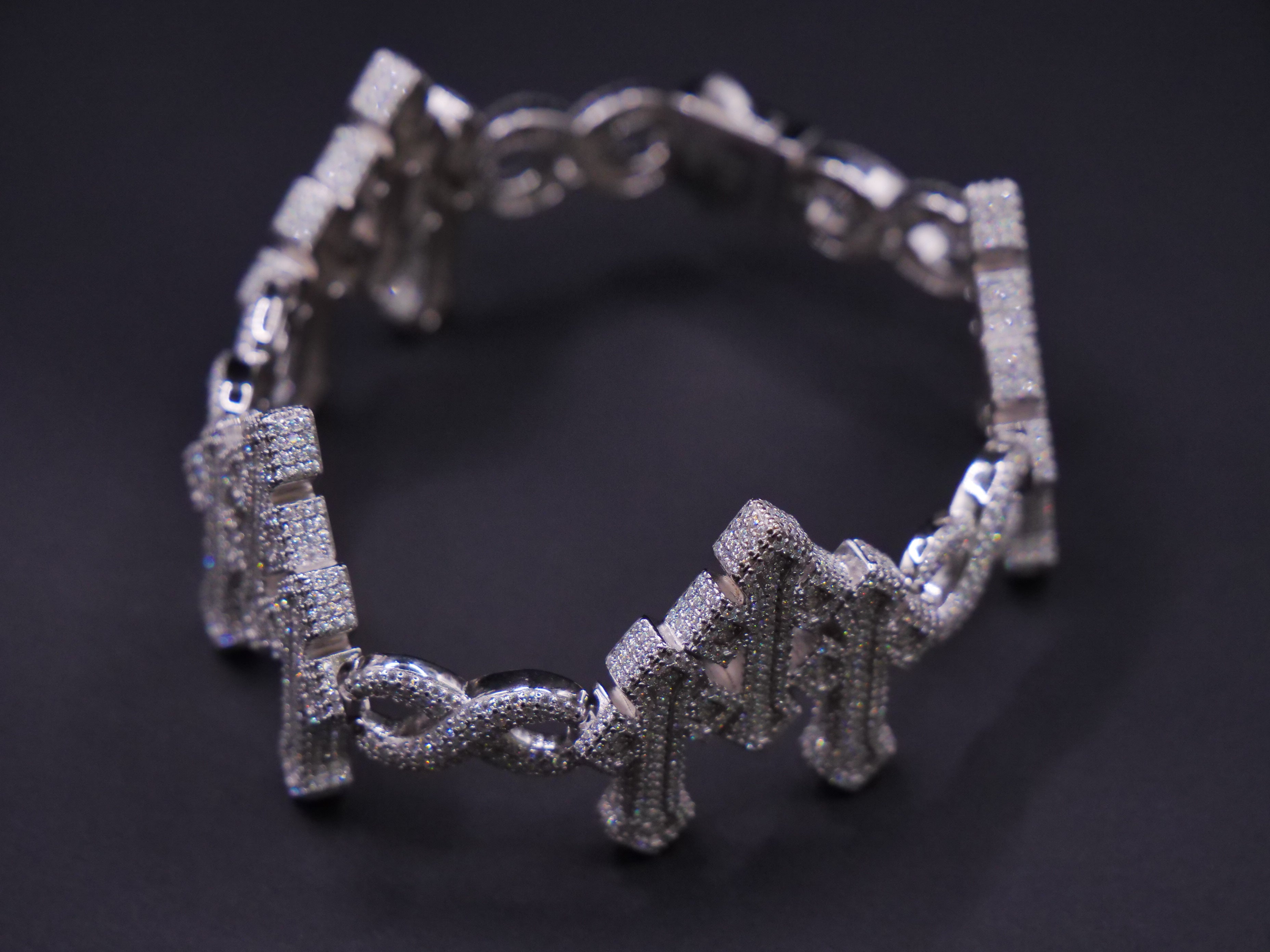 Iced Out Infinity Link Bracelet In Silver With Full Pavé CZ & Box Clasp Closure