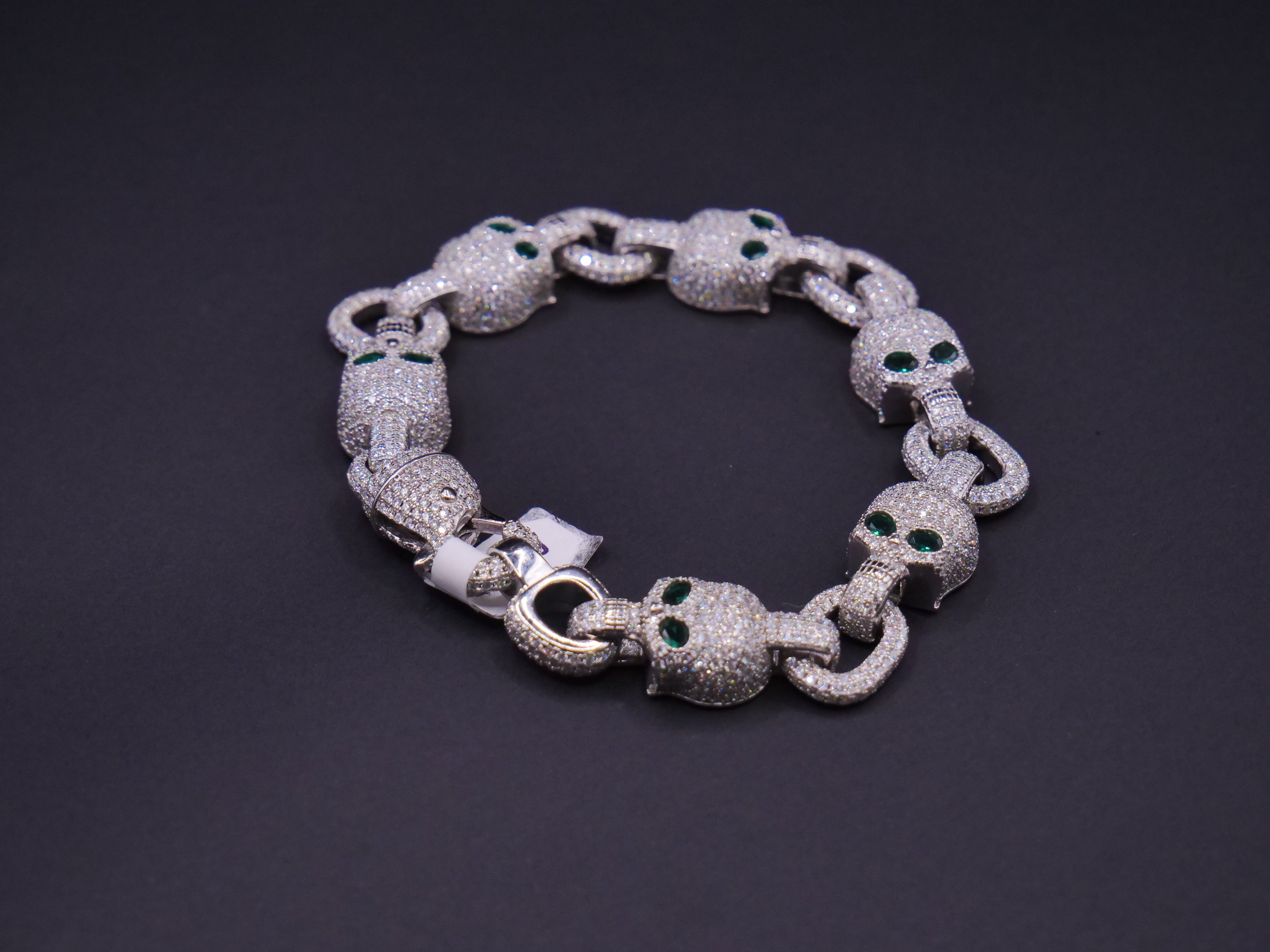 Iced Out Skull Link Bracelet In Silver With Full Pavé CZ & Emerald Eyes