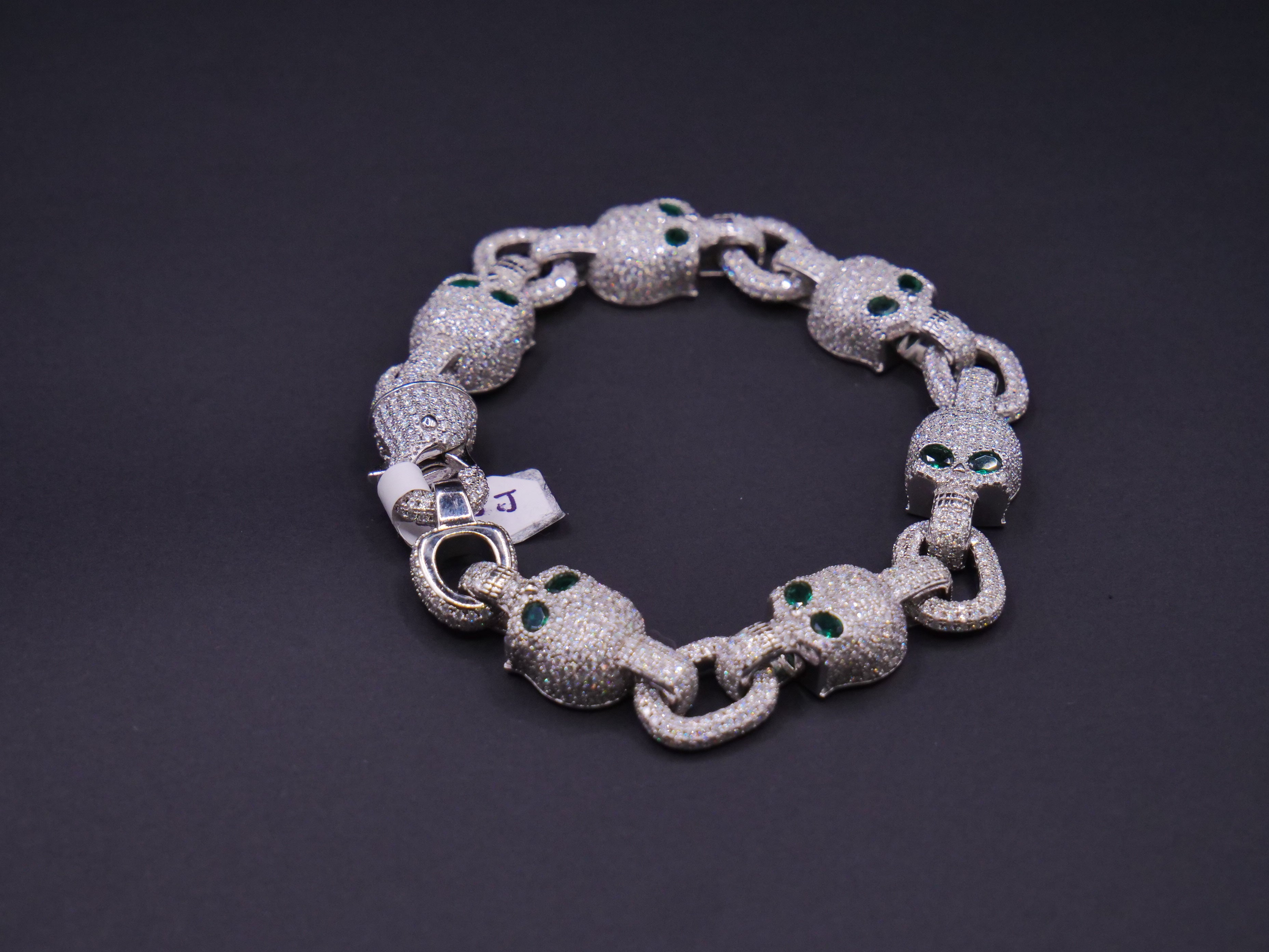 Iced Out Skull Link Bracelet In Silver With Full Pavé CZ & Emerald Eyes