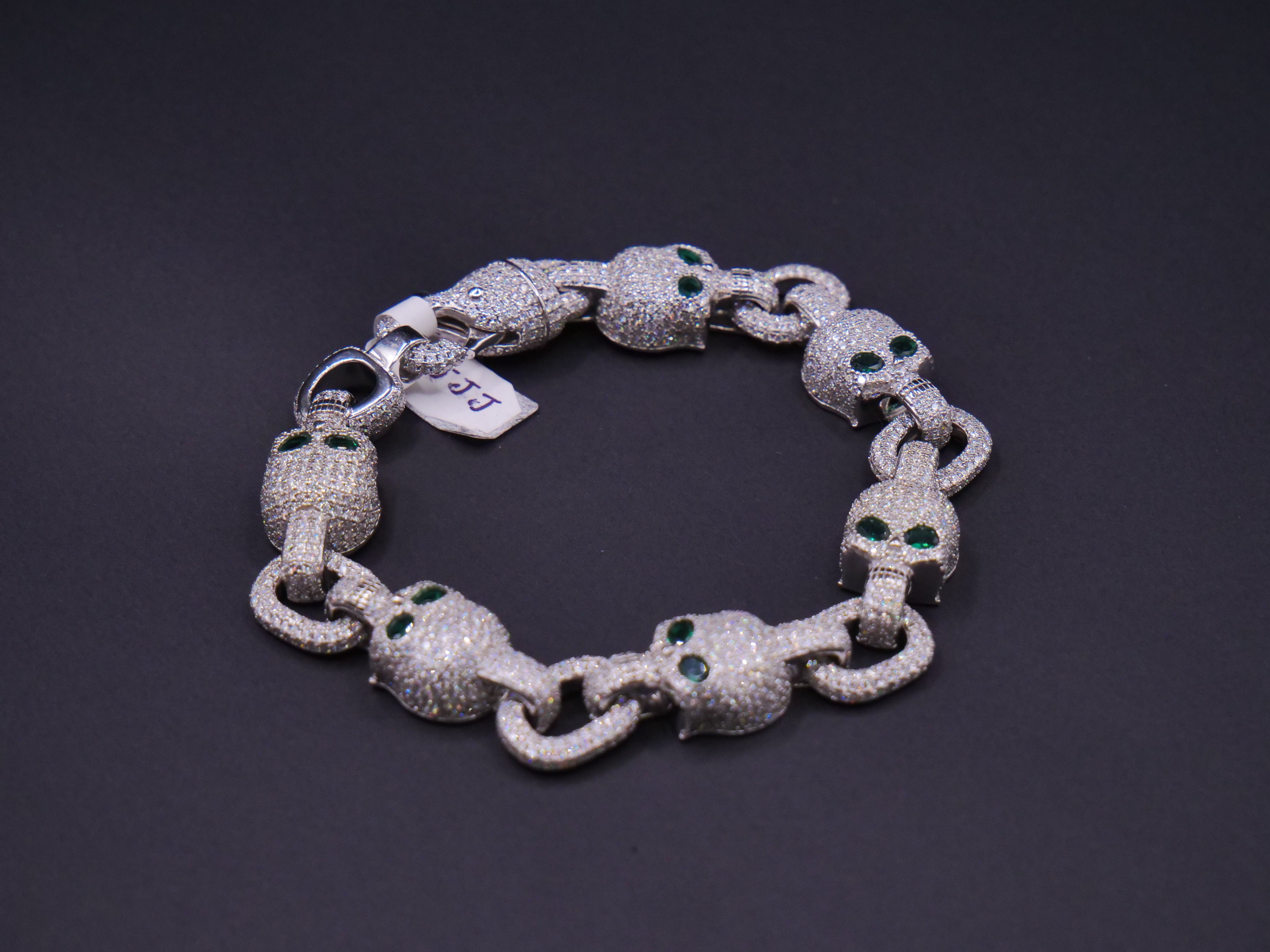Iced Out Skull Link Bracelet In Silver With Full Pavé CZ & Emerald Eyes
