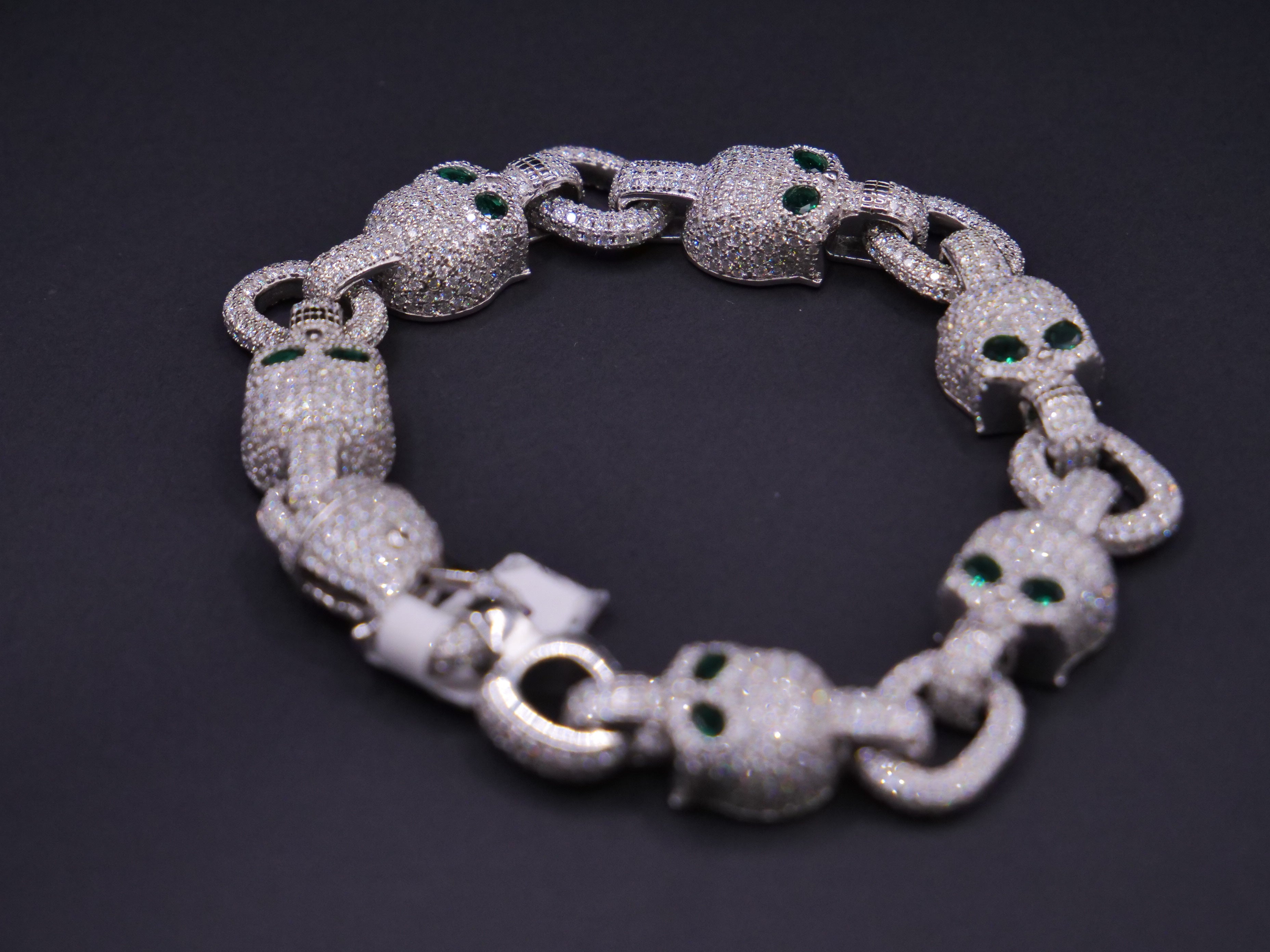 Iced Out Skull Link Bracelet In Silver With Full Pavé CZ & Emerald Eyes