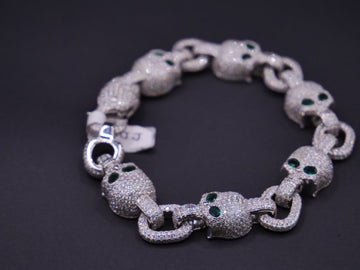 Iced Out Skull Link Bracelet In Silver With Full Pavé CZ & Emerald Eyes