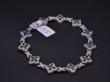 Emerald & Pavé Four-Petal Floral Link Tennis Bracelet In Silver