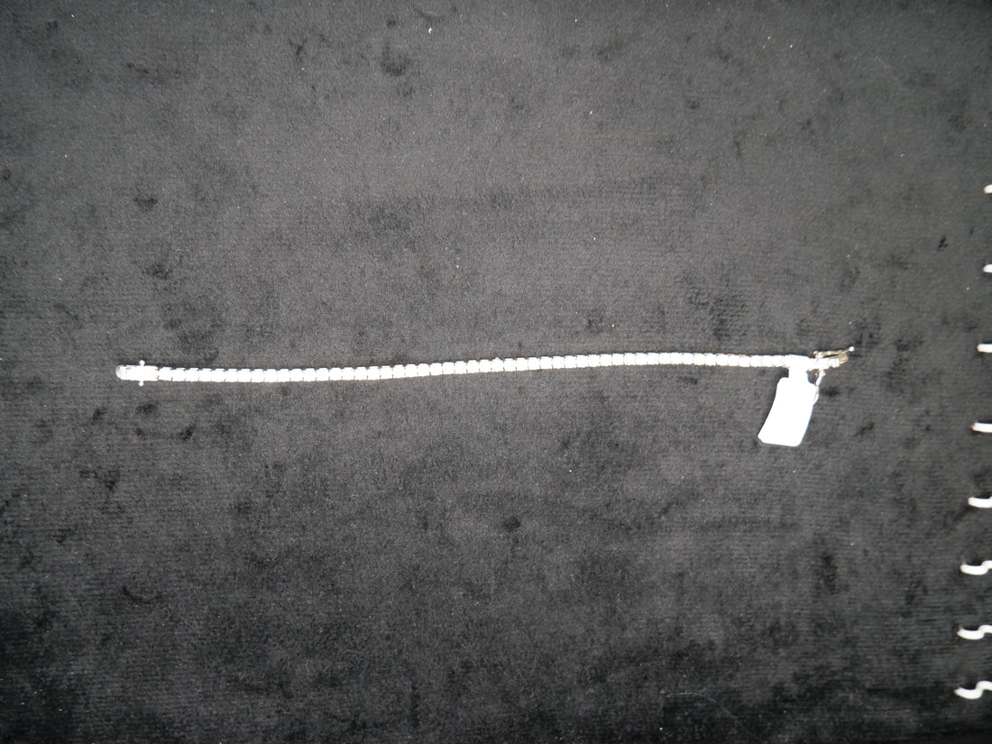 Slim Pavé Diamond Tennis Bracelet In Polished White Gold