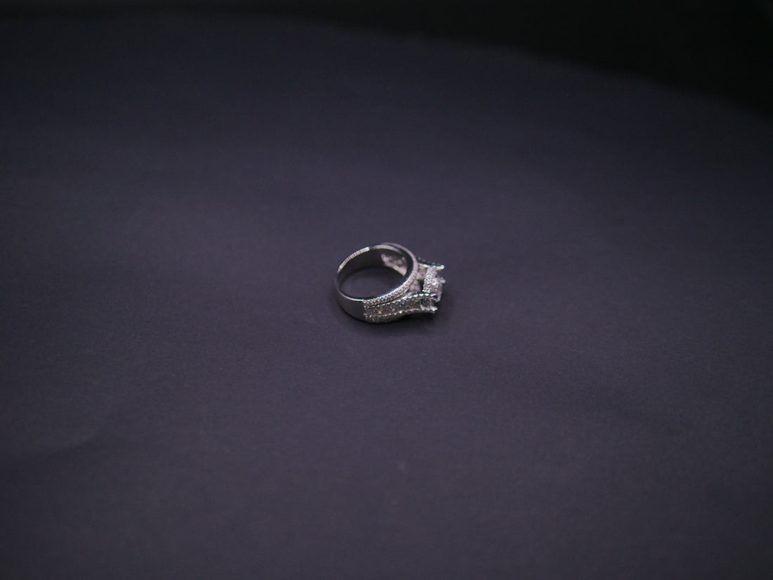 Round Brilliant Halo Engagement Ring With Split Pavé Shank In White Gold