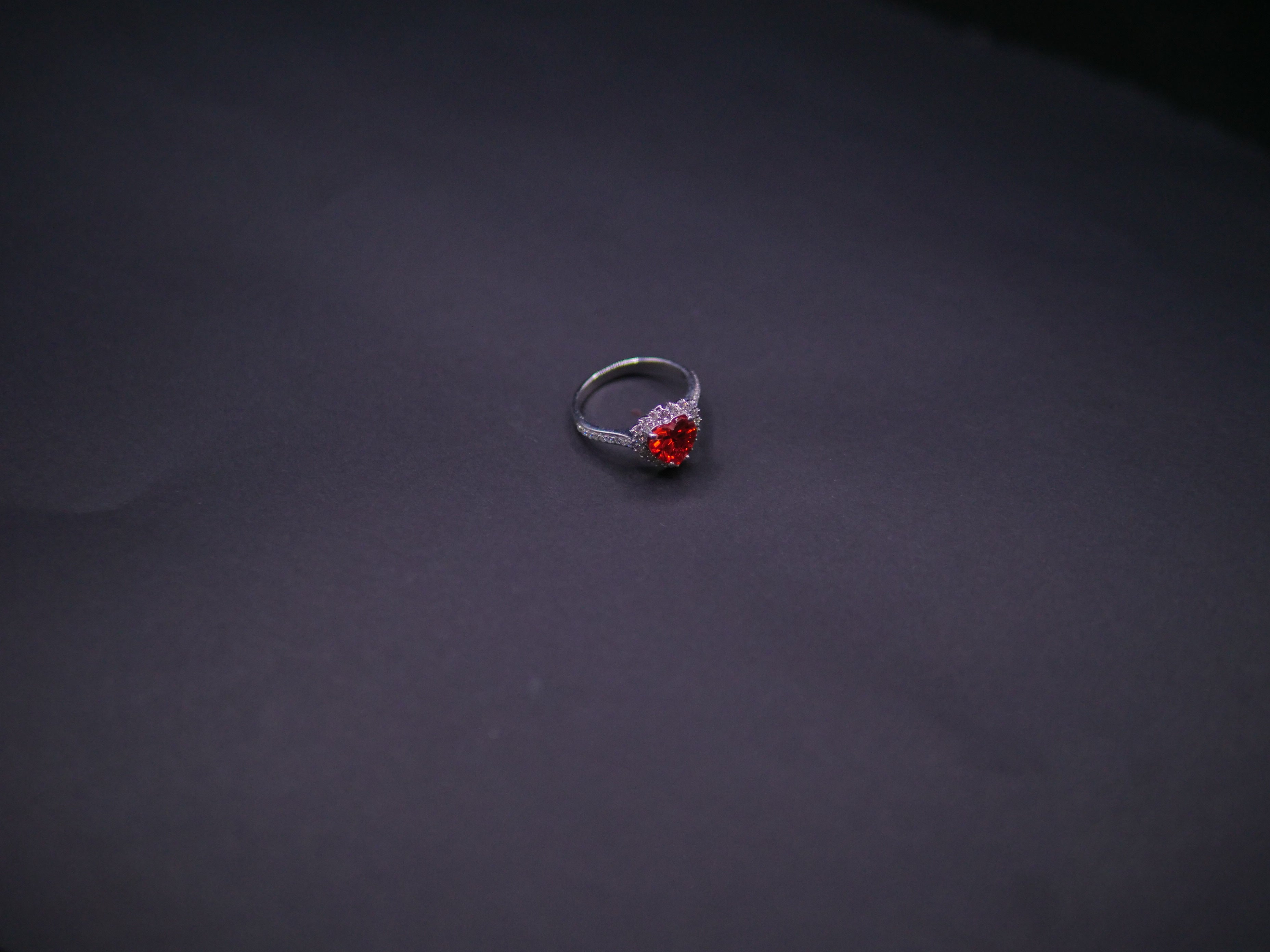 Ruby Red Heart-Cut CZ Halo Ring In White Gold
