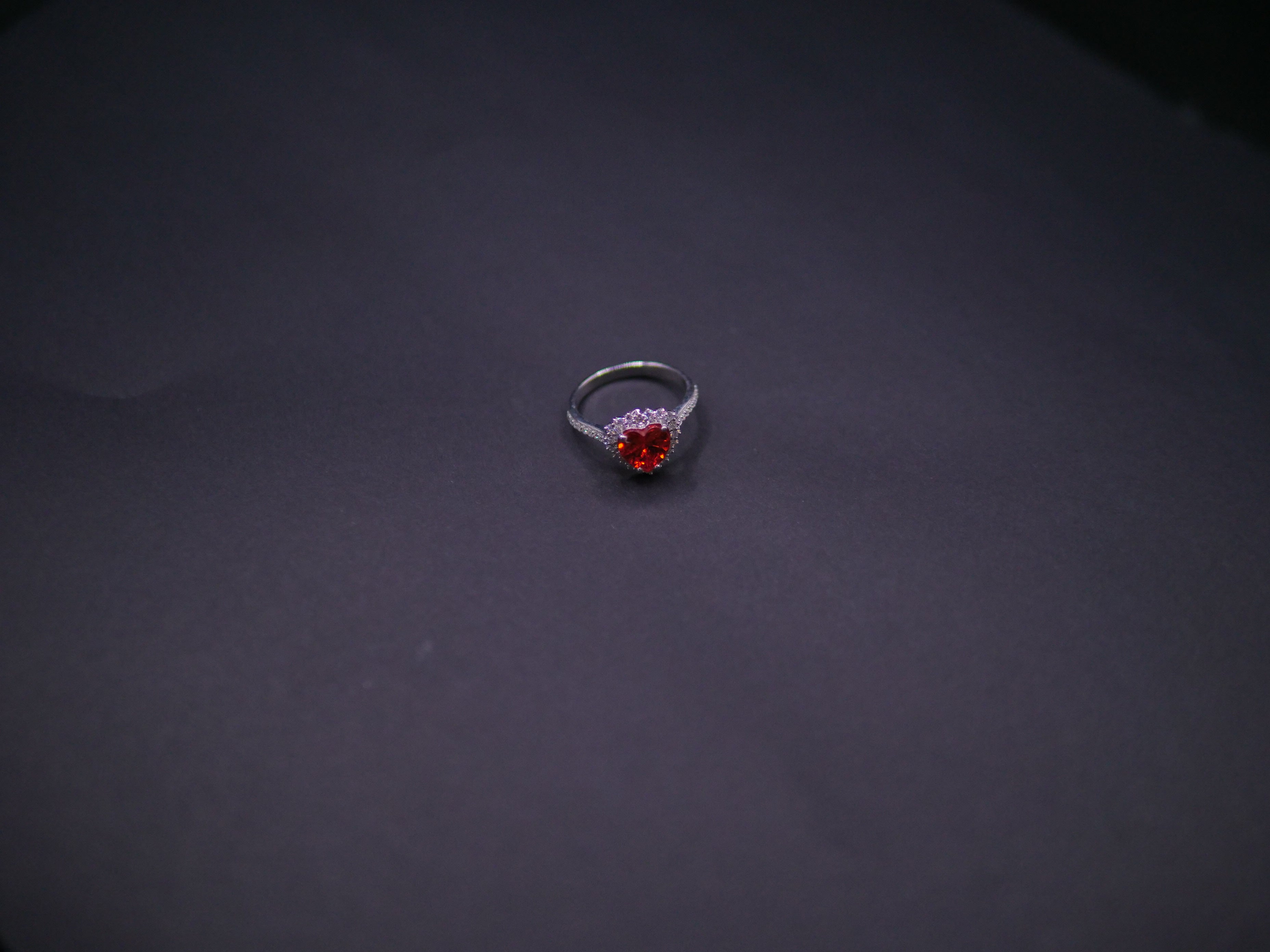 Ruby Red Heart-Cut CZ Halo Ring In White Gold