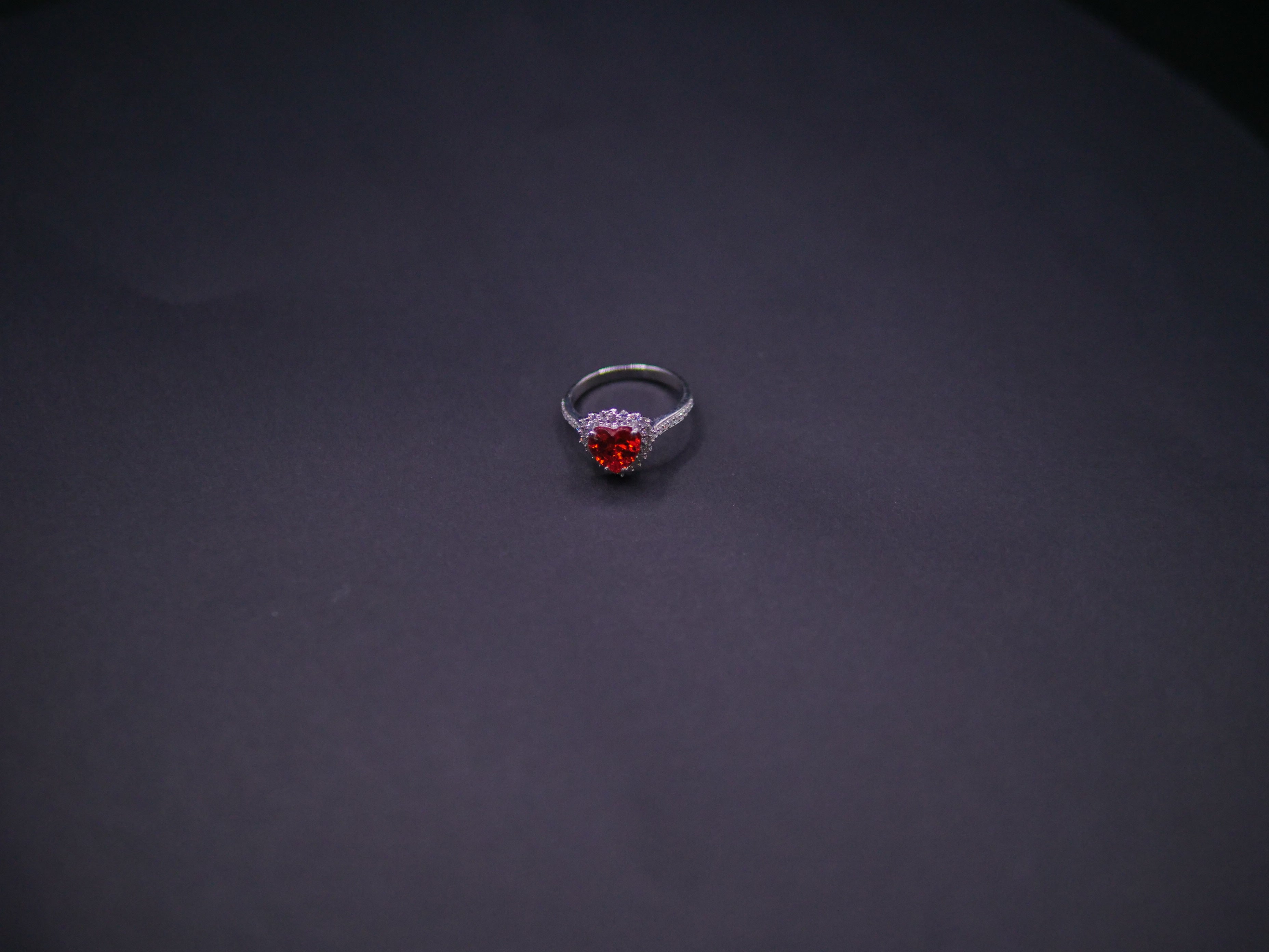 Ruby Red Heart-Cut CZ Halo Ring In White Gold