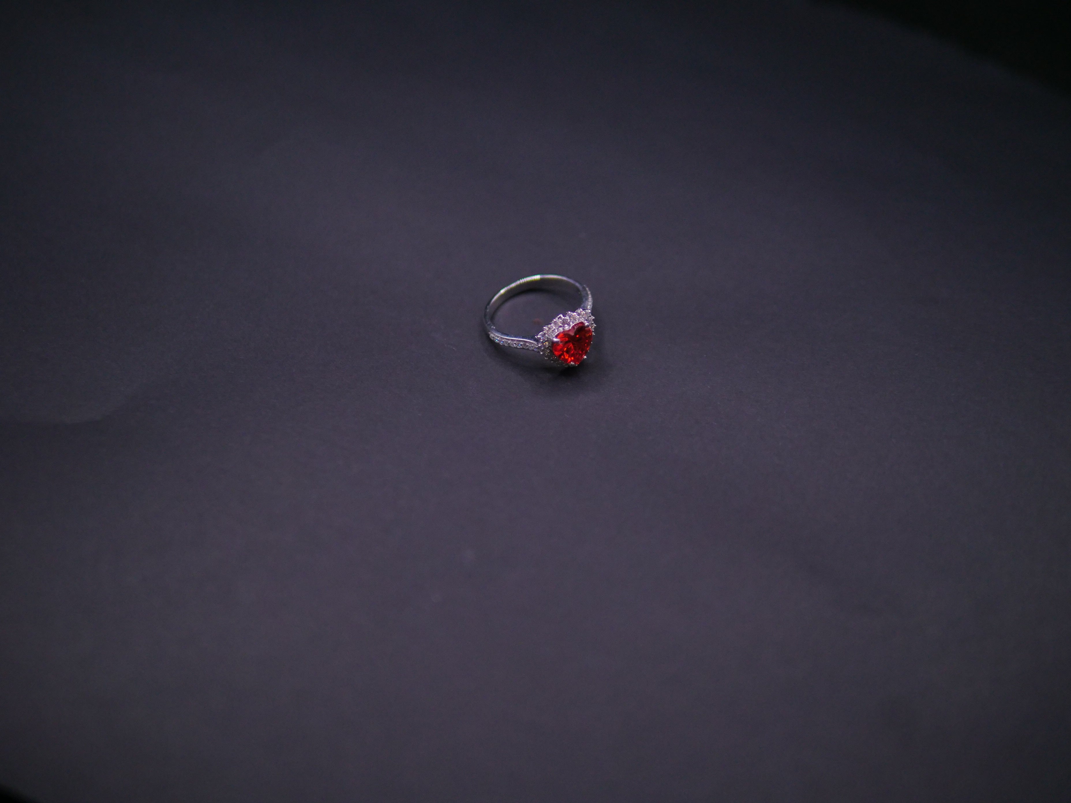 Ruby Red Heart-Cut CZ Halo Ring In White Gold