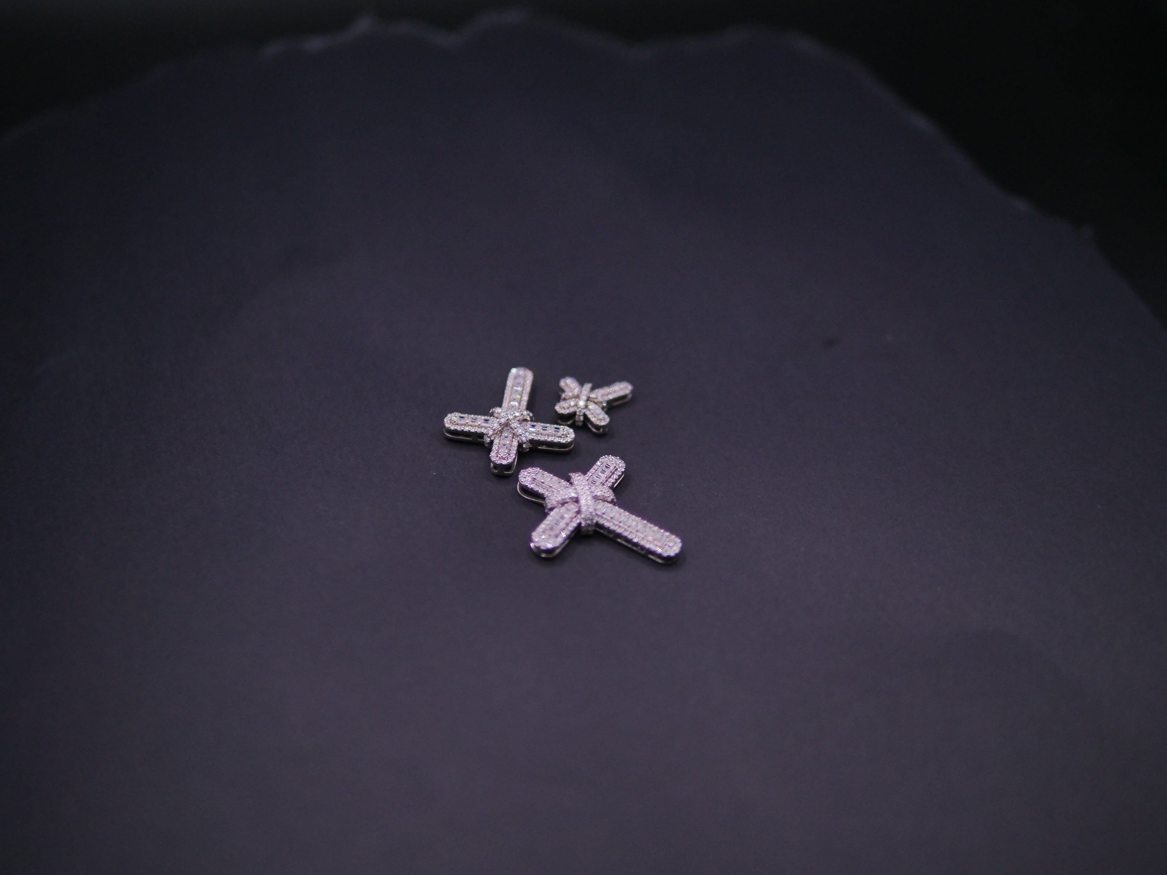 Pavé Diamond Bow-Tied Cross Pendant In White Gold
