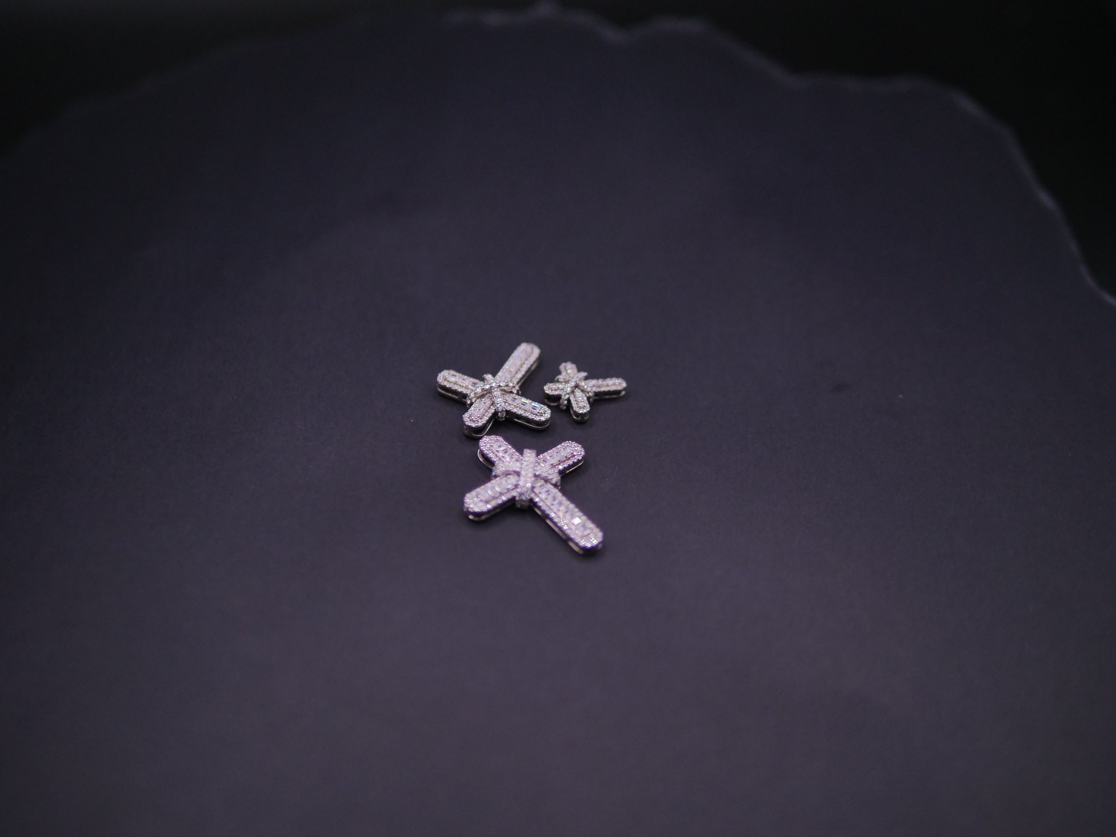 Pavé Diamond Bow-Tied Cross Pendant In White Gold