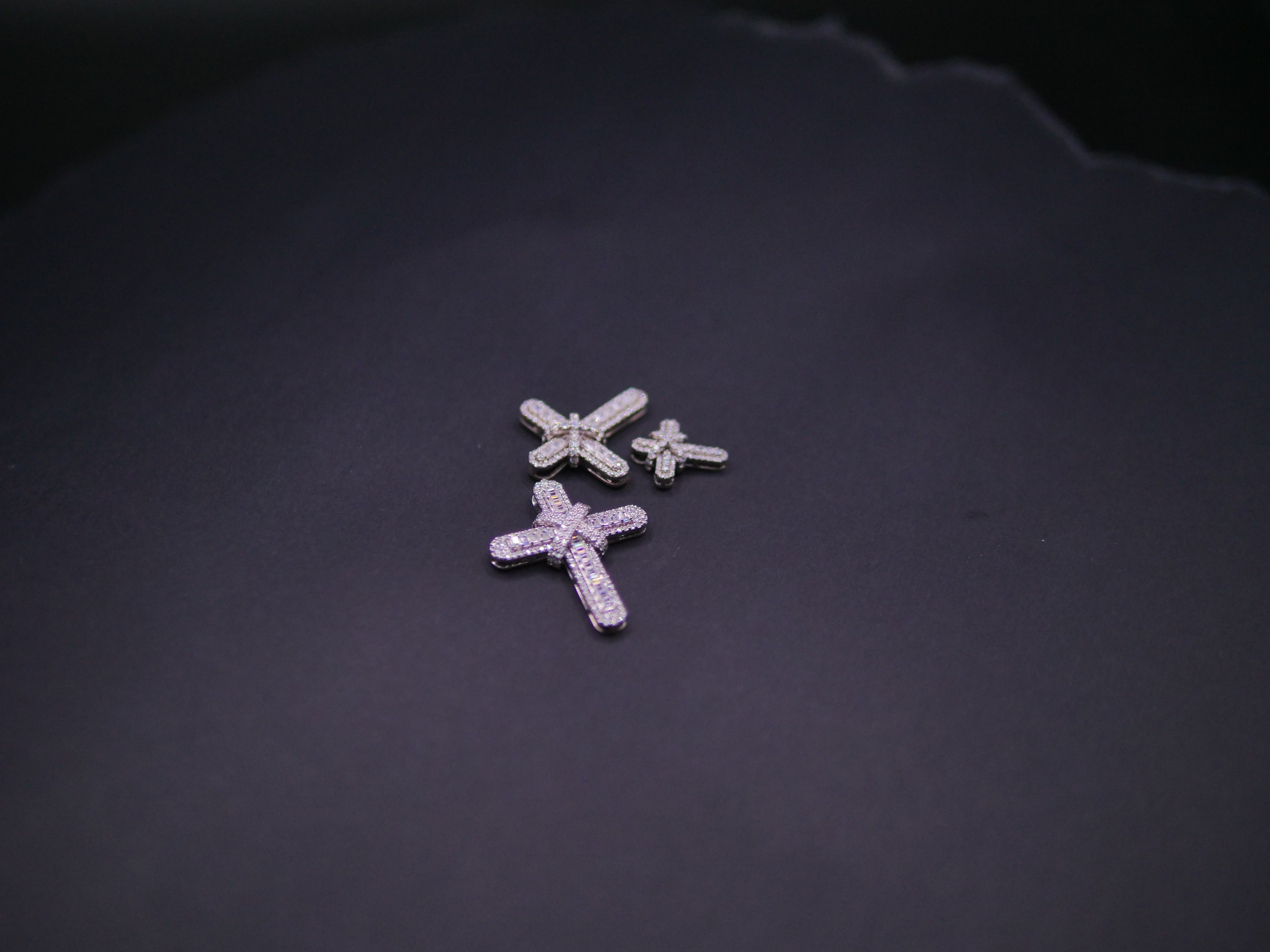 Pavé Diamond Bow-Tied Cross Pendant In White Gold