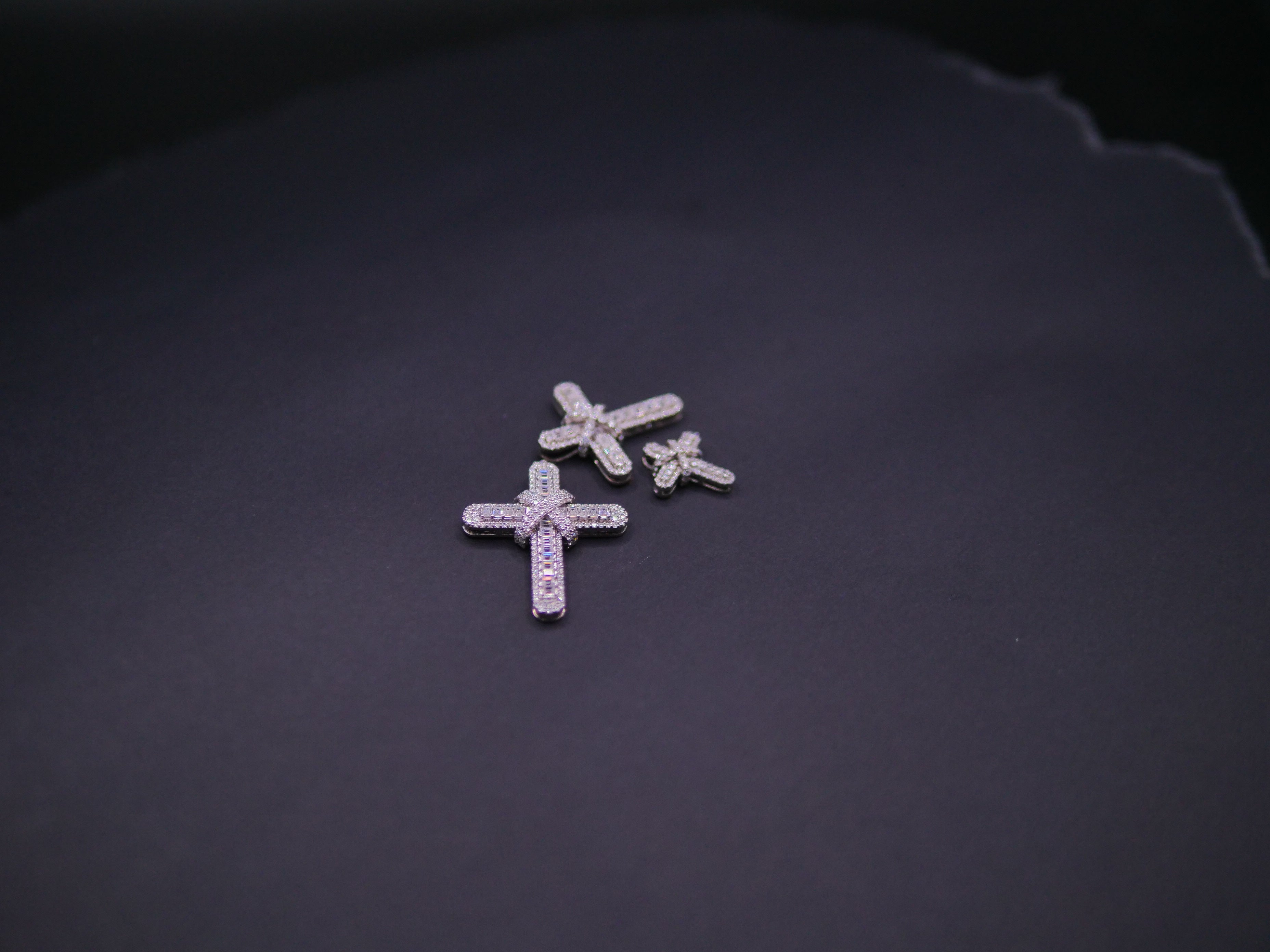 Pavé Diamond Bow-Tied Cross Pendant In White Gold