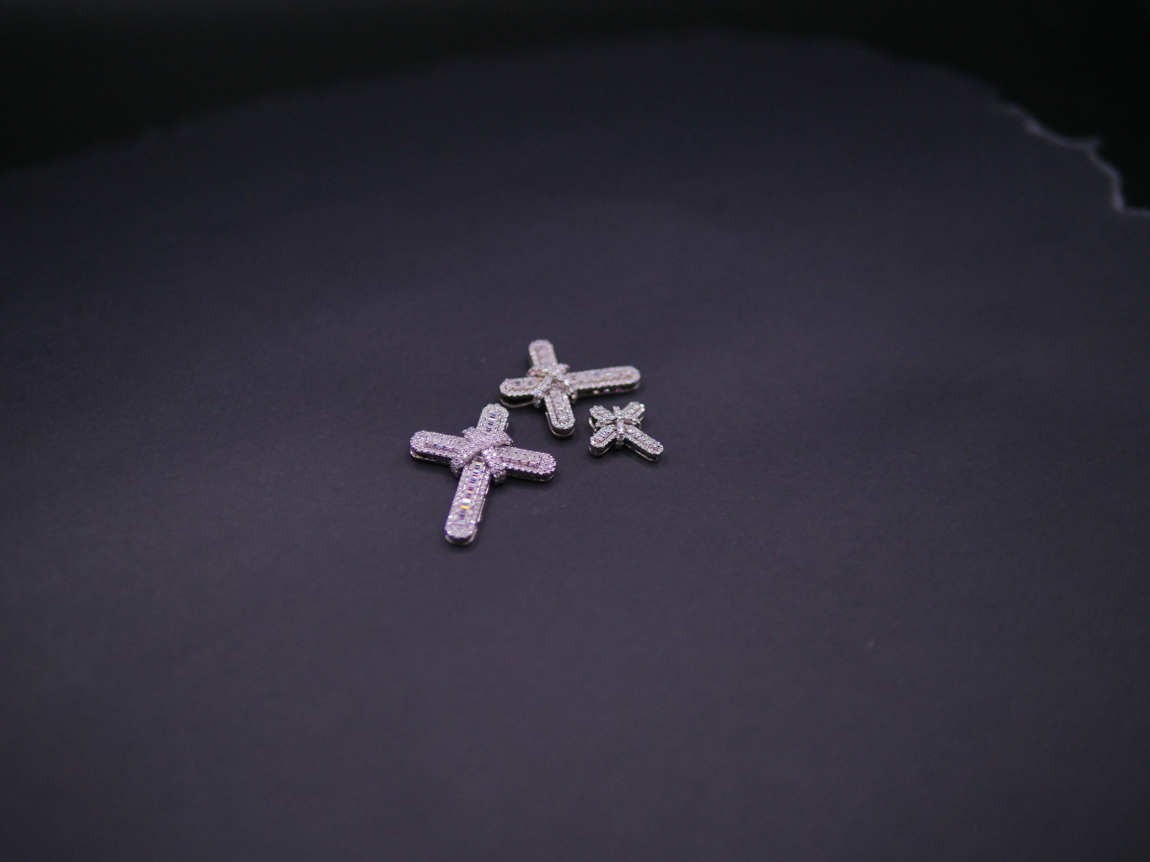 Pavé Diamond Bow-Tied Cross Pendant In White Gold