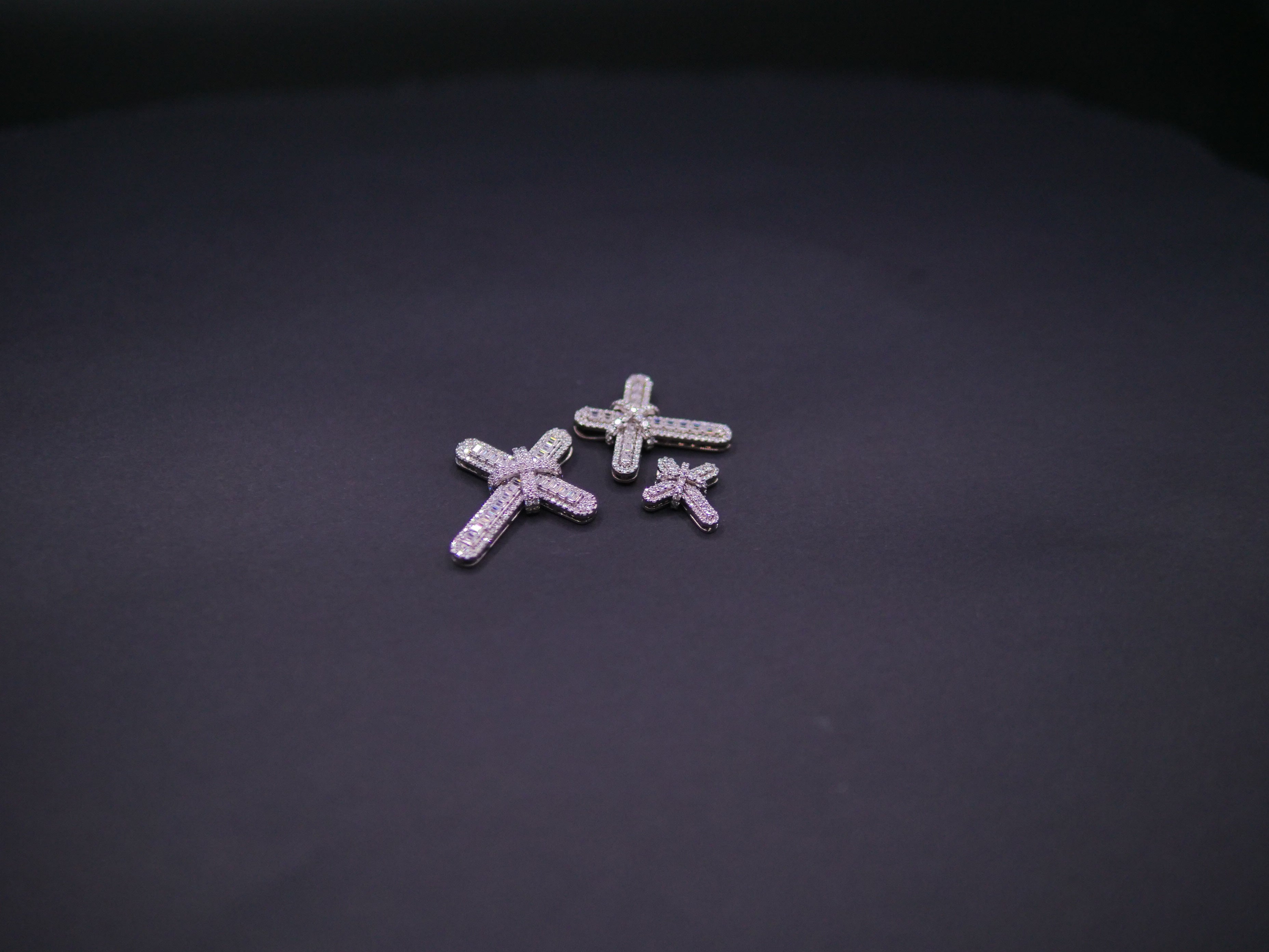 Pavé Diamond Bow-Tied Cross Pendant In White Gold
