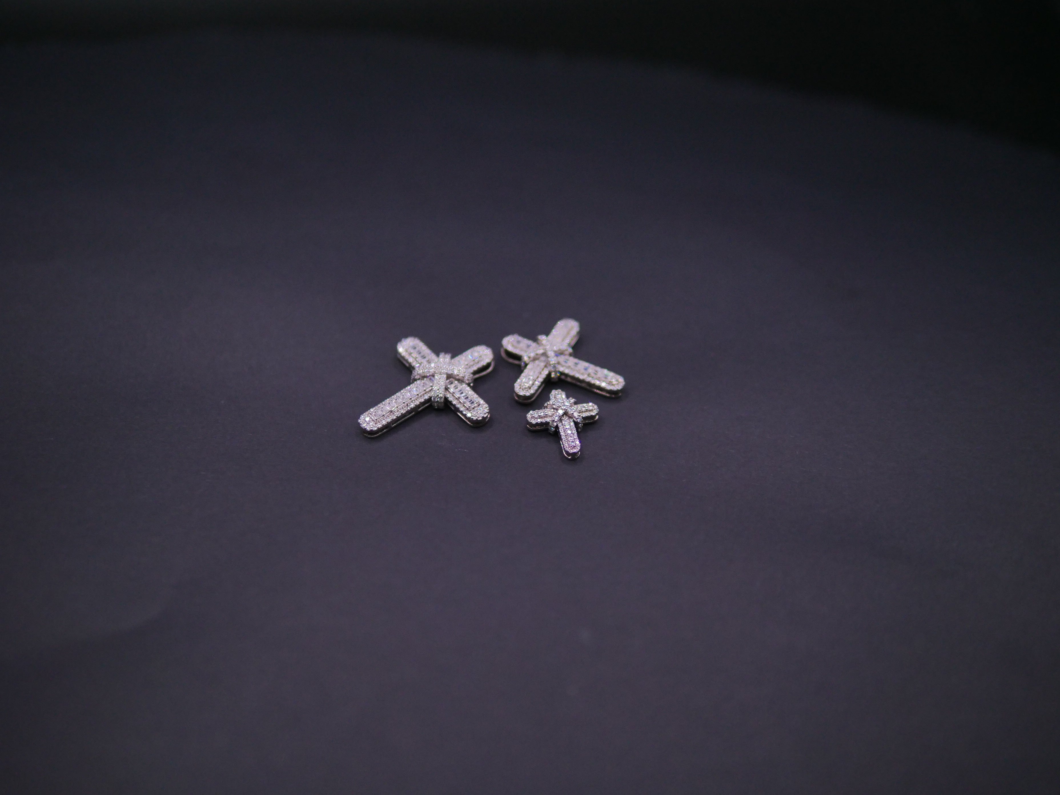 Pavé Diamond Bow-Tied Cross Pendant In White Gold