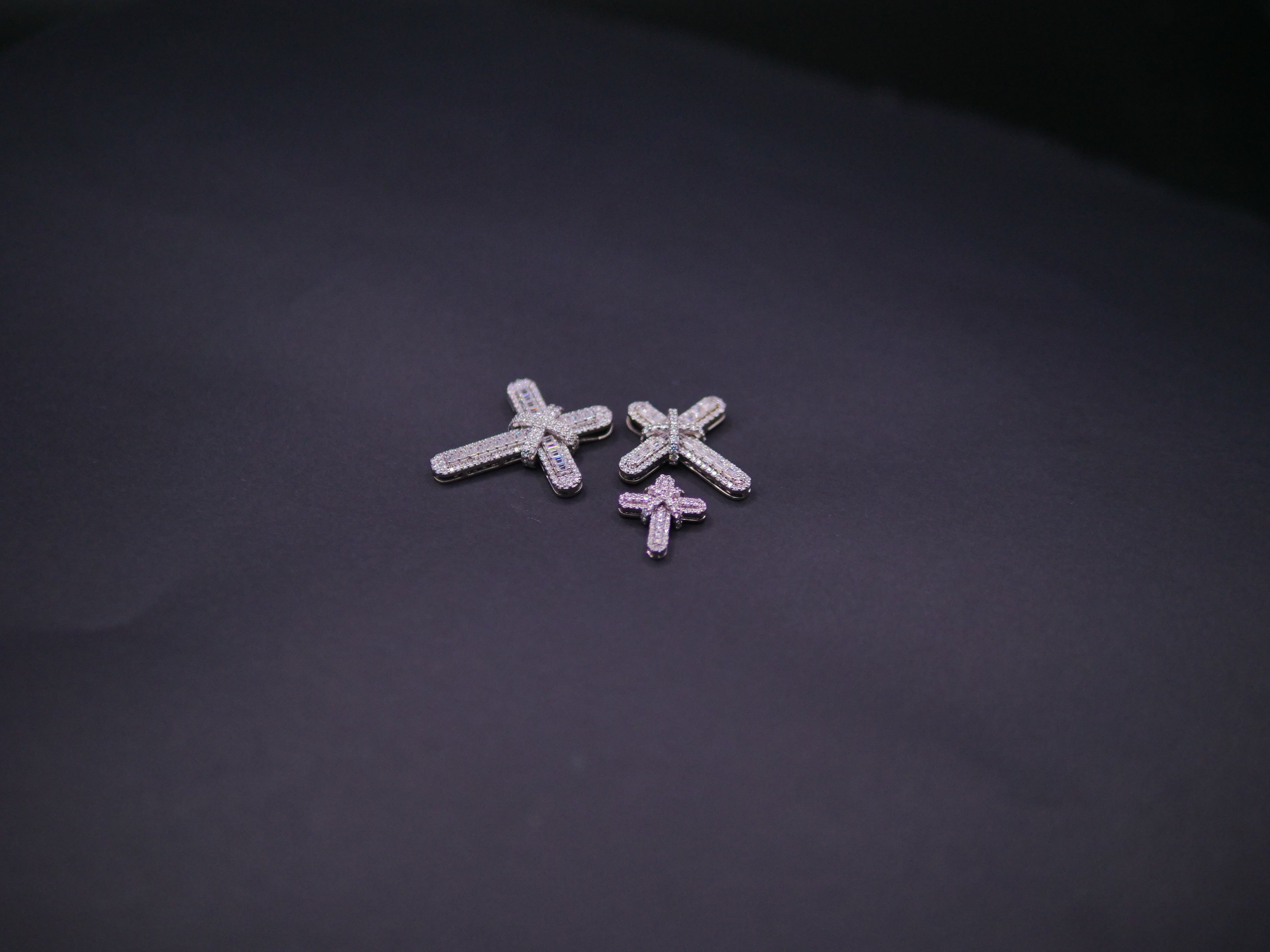 Pavé Diamond Bow-Tied Cross Pendant In White Gold