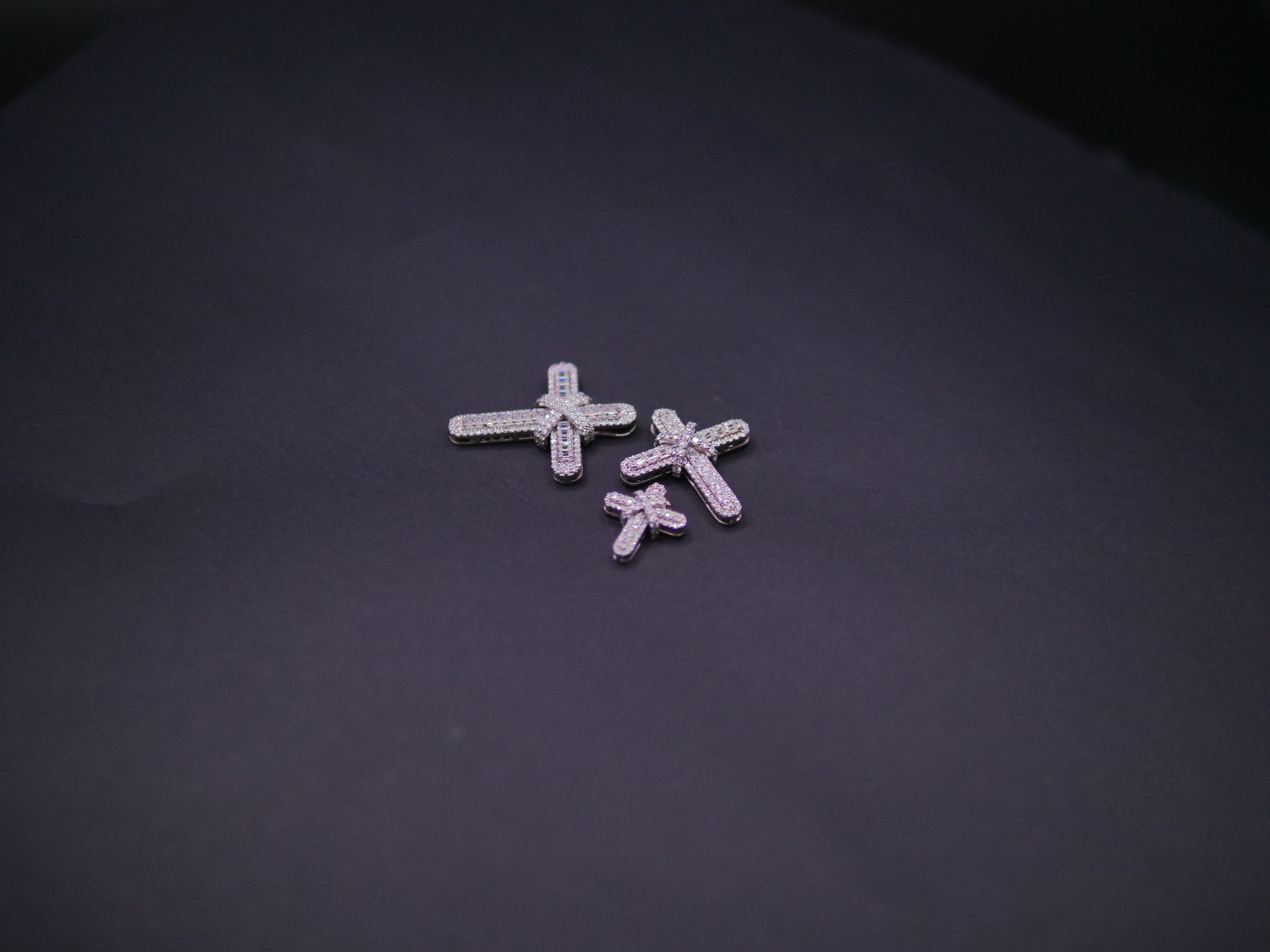 Pavé Diamond Bow-Tied Cross Pendant In White Gold