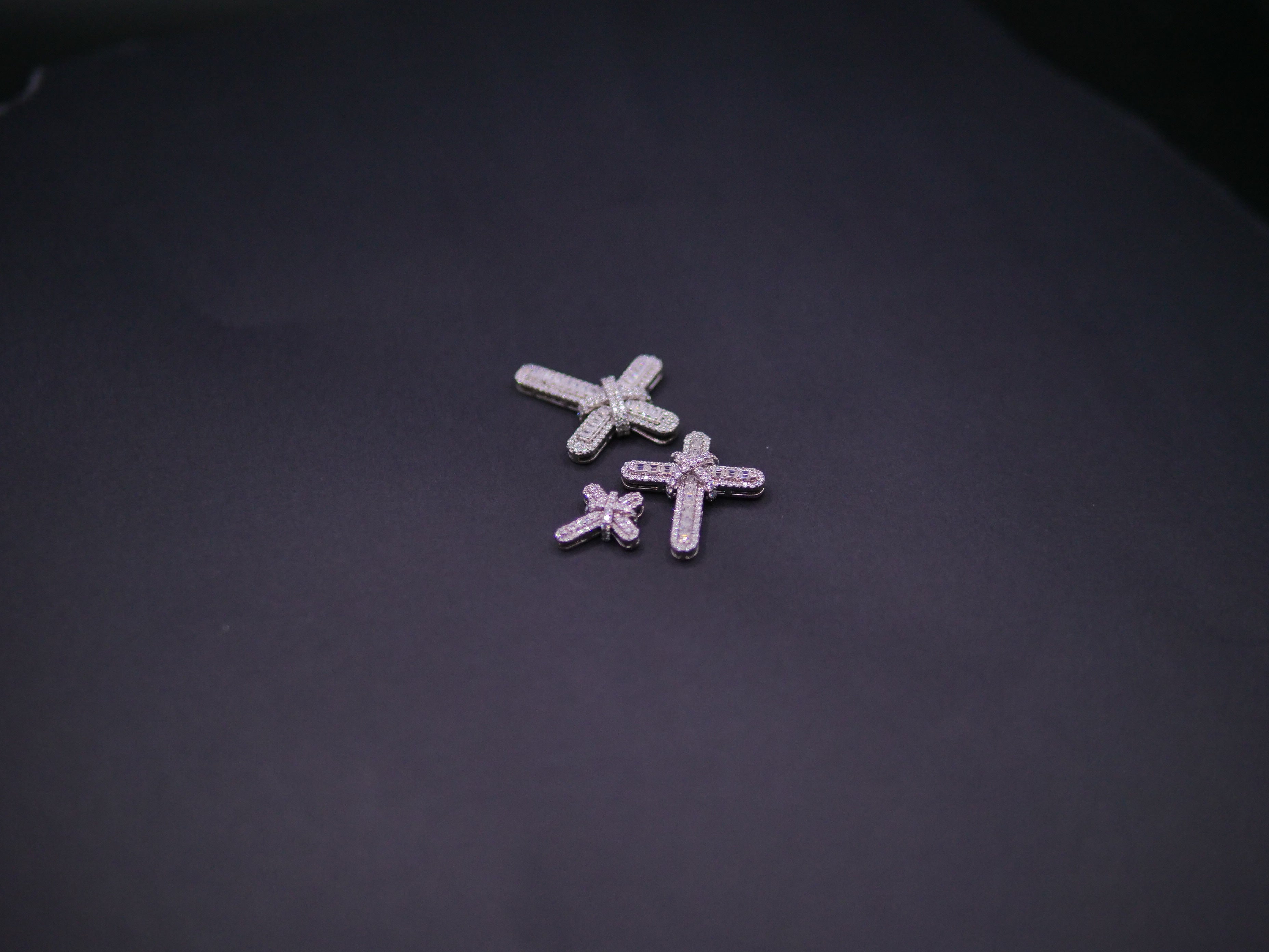 Pavé Diamond Bow-Tied Cross Pendant In White Gold