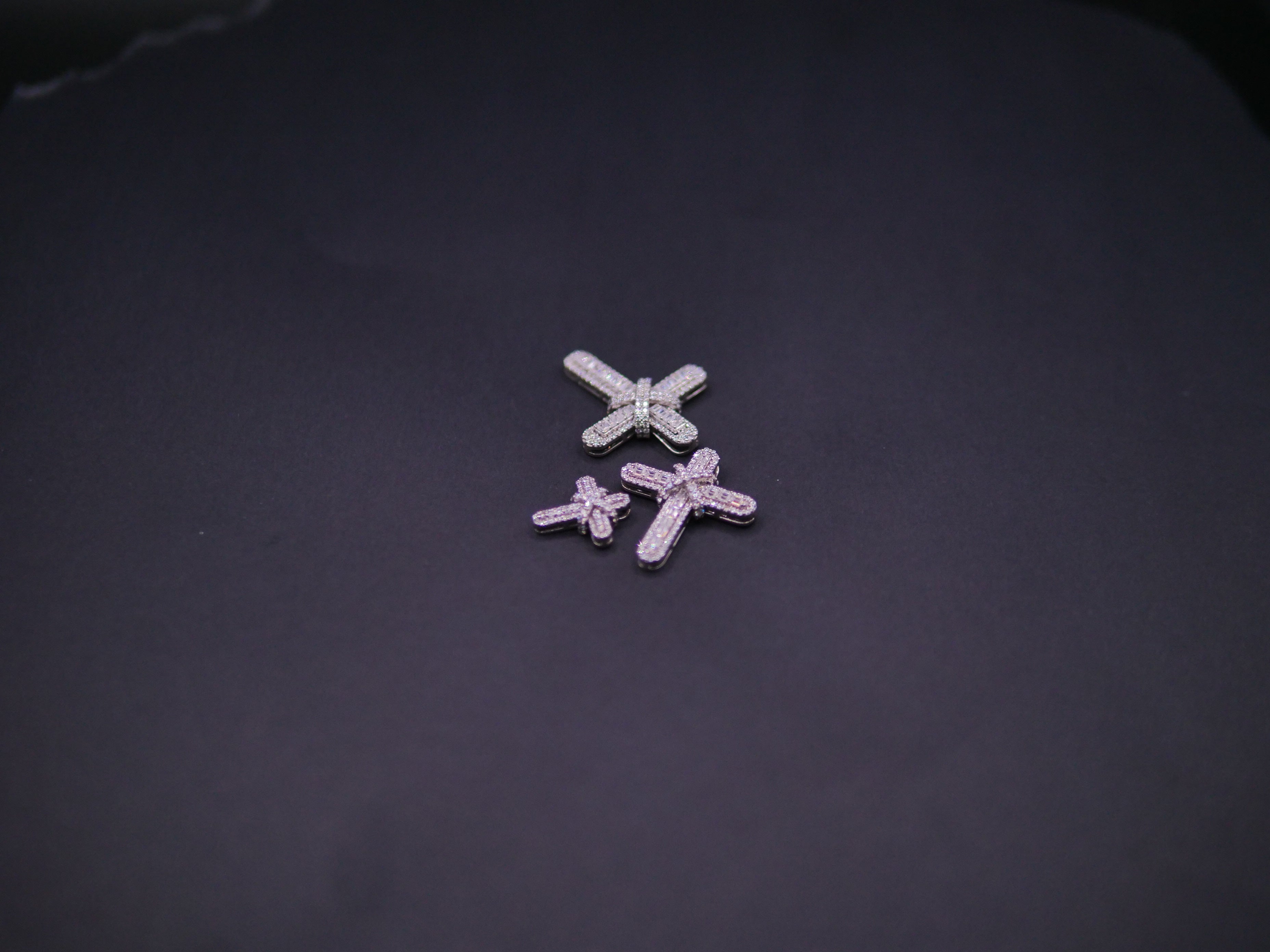 Pavé Diamond Bow-Tied Cross Pendant In White Gold
