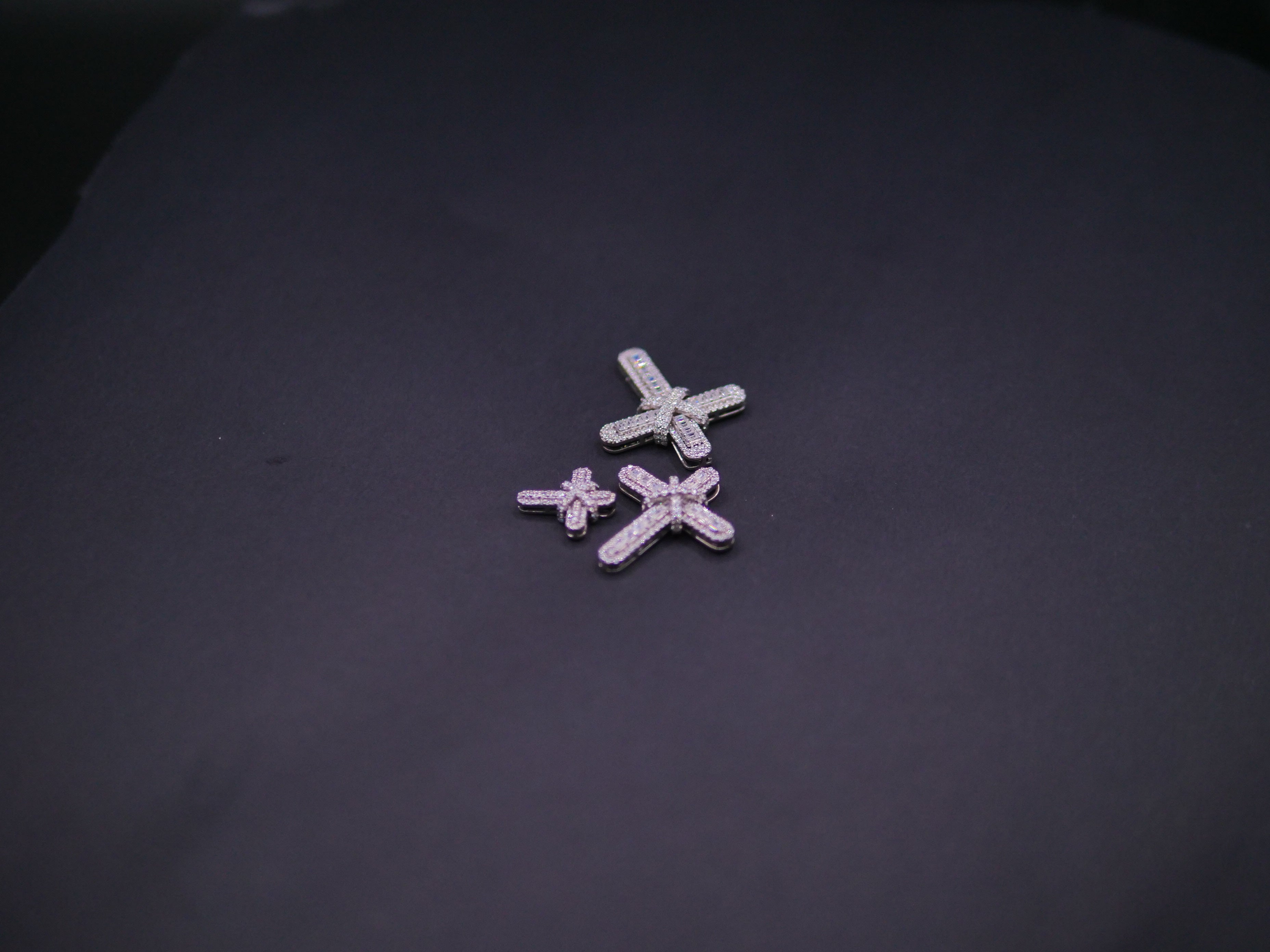 Pavé Diamond Bow-Tied Cross Pendant In White Gold