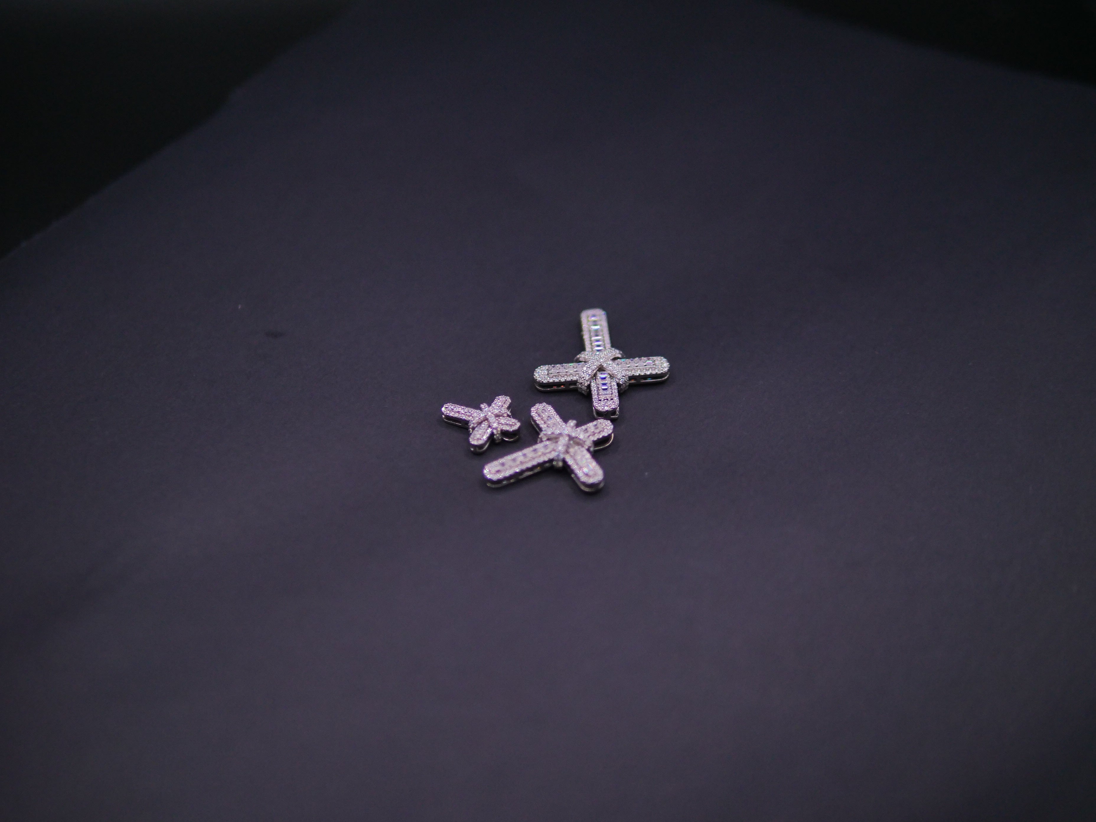 Pavé Diamond Bow-Tied Cross Pendant In White Gold