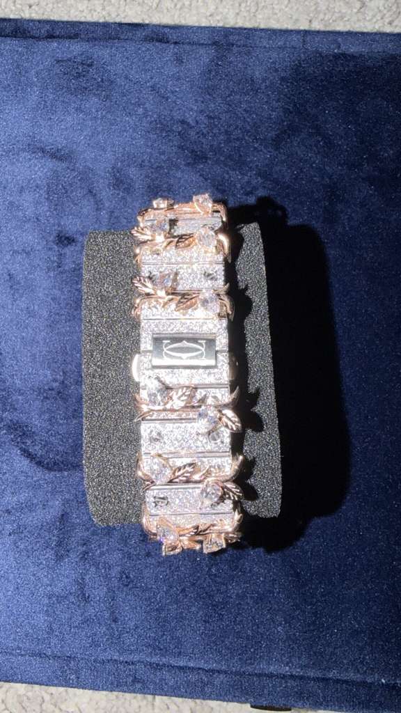 The Santos "Throne of Thorns" Bustdown Timepiece in Rose Gold & Pavé Crystals
