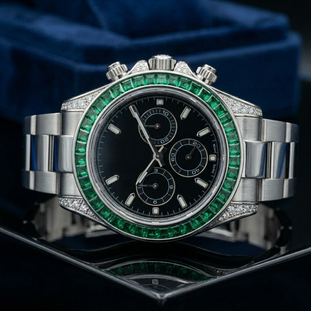 The Sovereign Chronograph Bustdown — Baguette Emerald & VVS Bezel Edition