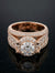 Rose gold ring with diamond accents on a black background