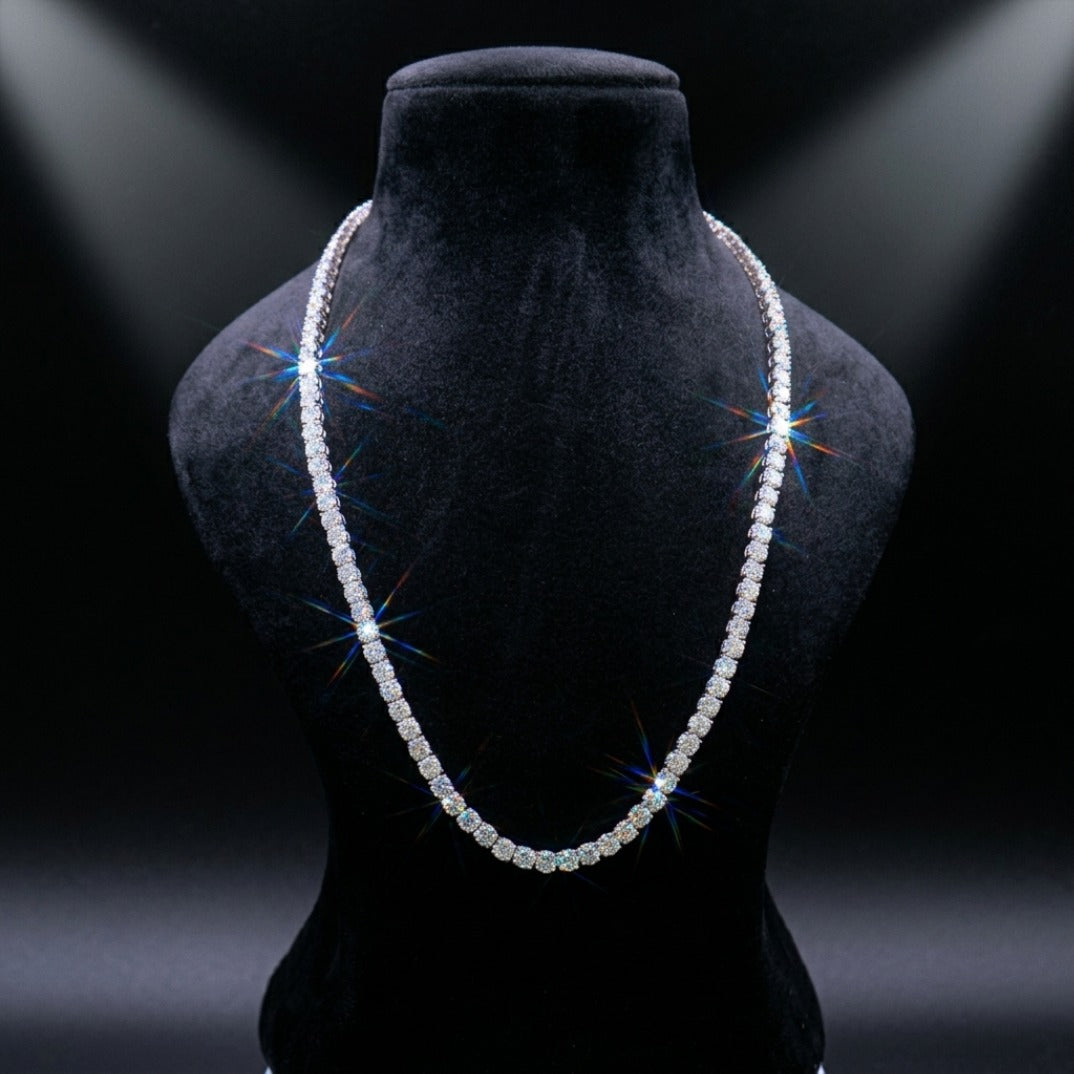 Pearl necklace on a black mannequin bust with dramatic lighting