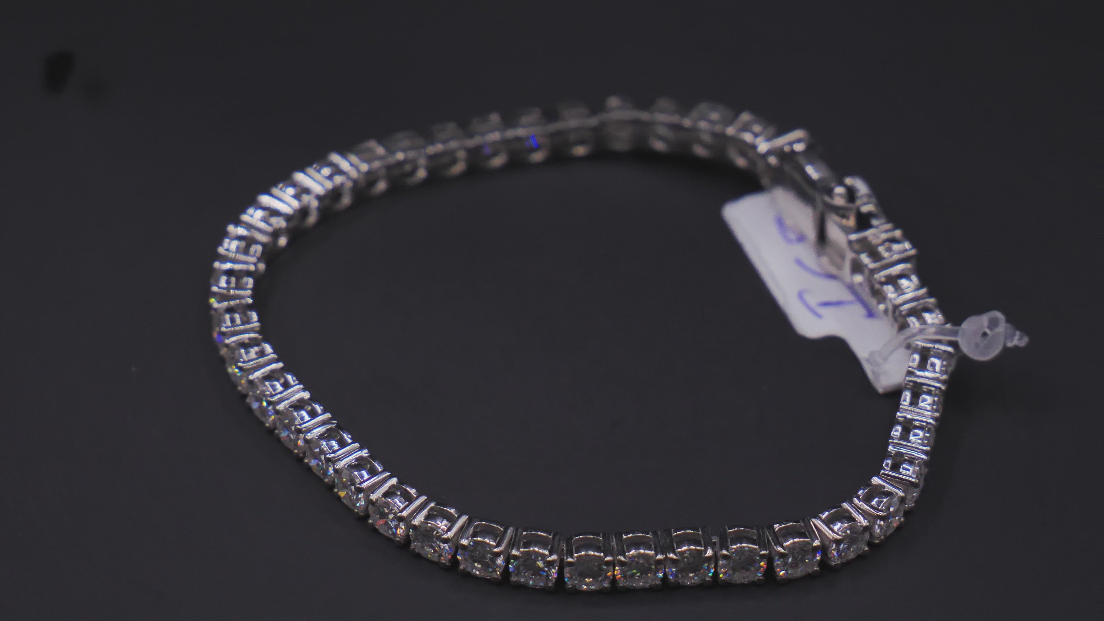 Round Four-Prong CZ Tennis Bracelet In White Gold With Box Clasp Closure