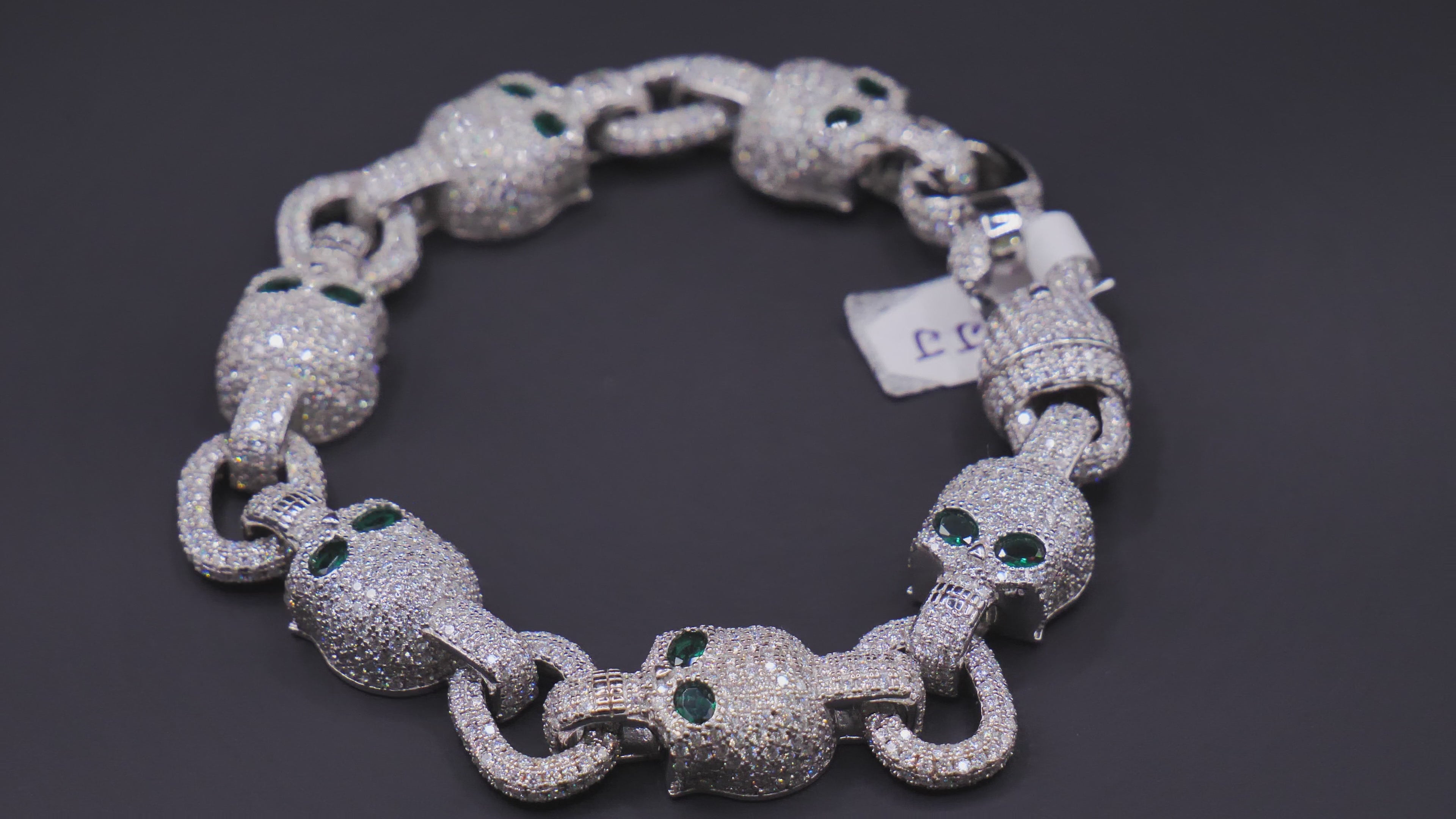 Iced Out Skull Link Bracelet In Silver With Full Pavé CZ & Emerald Eyes