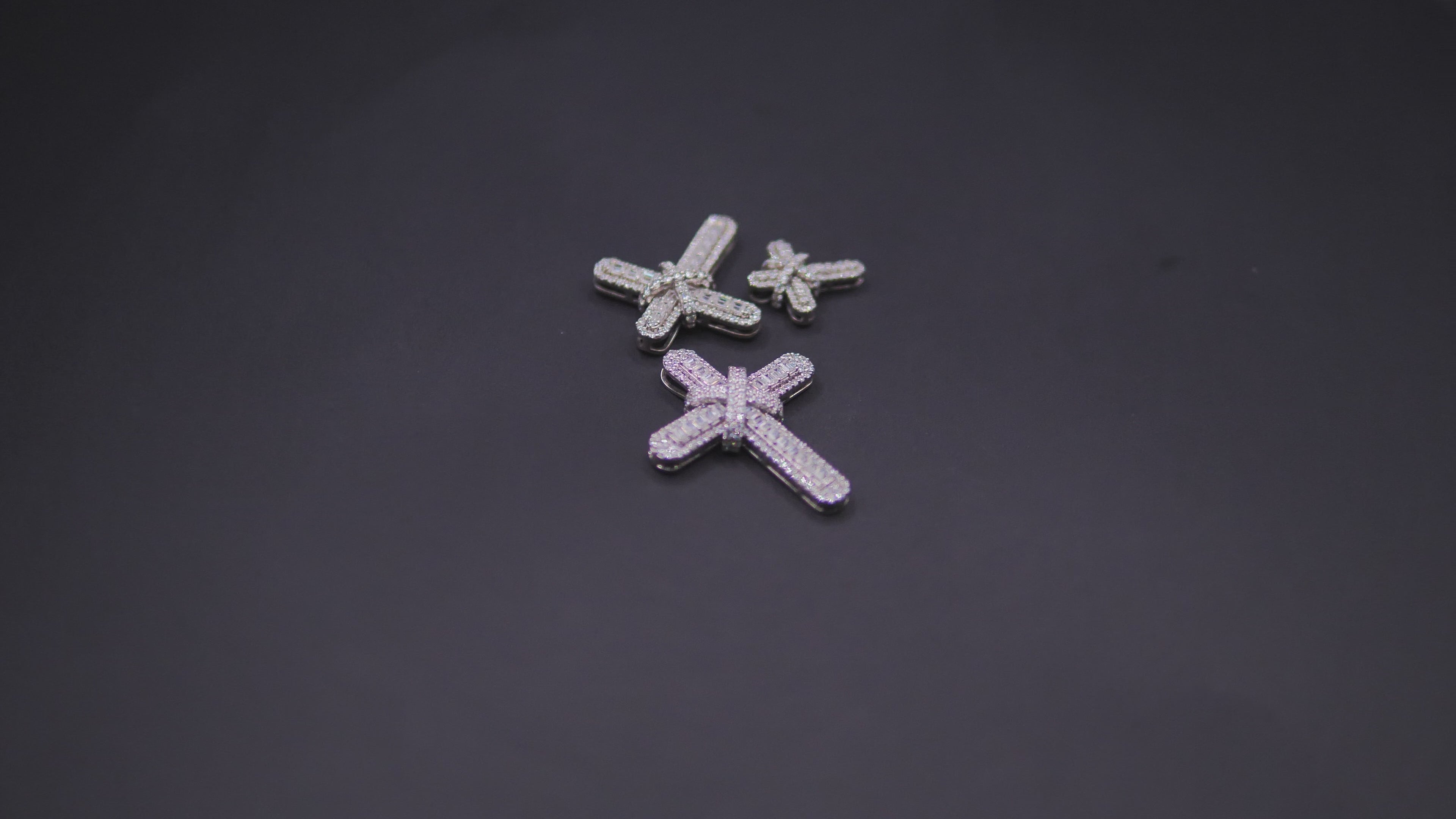 Pavé Diamond Bow-Tied Cross Pendant In White Gold